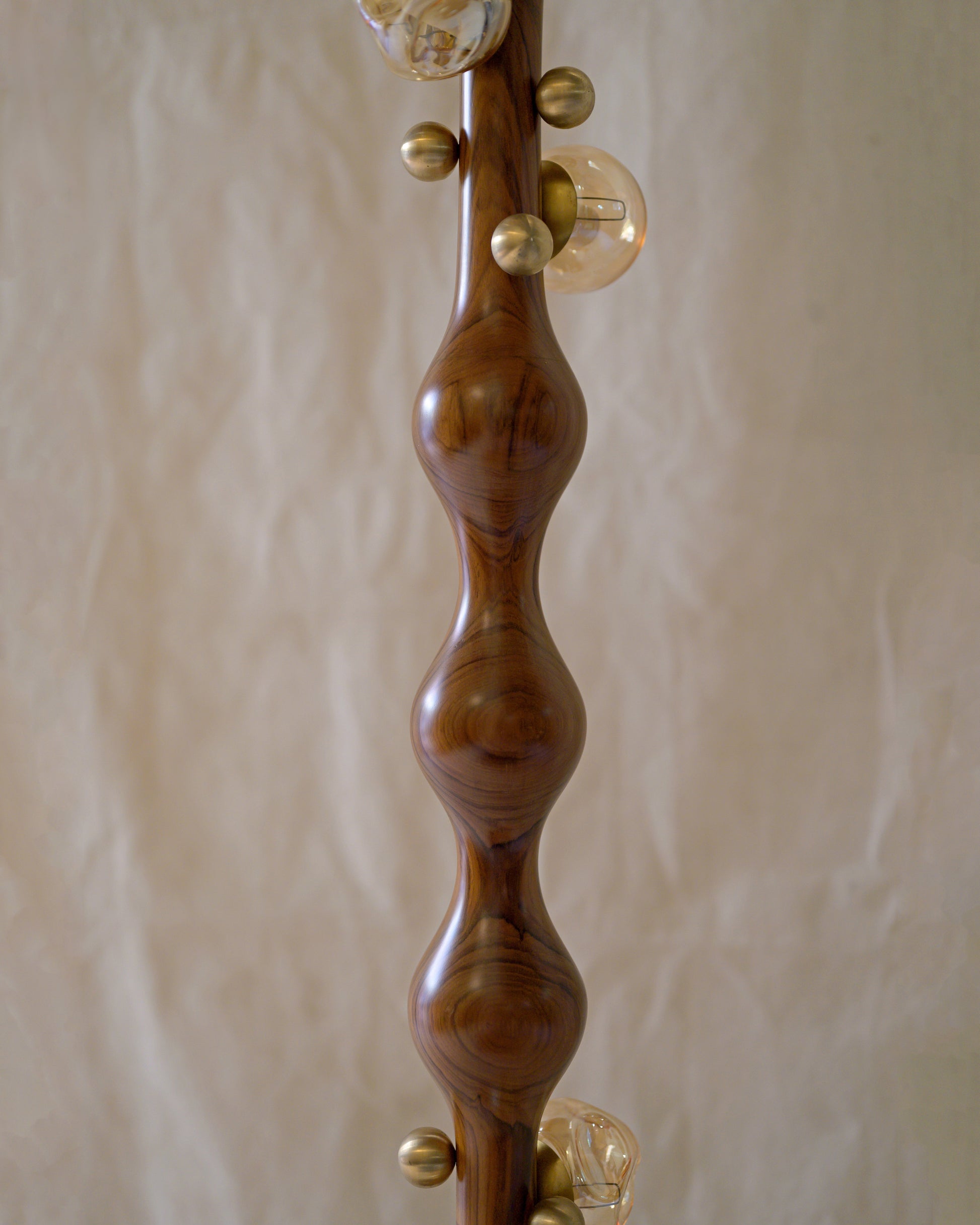 Stem Floor Lamp — back view highlighting curved wooden texture