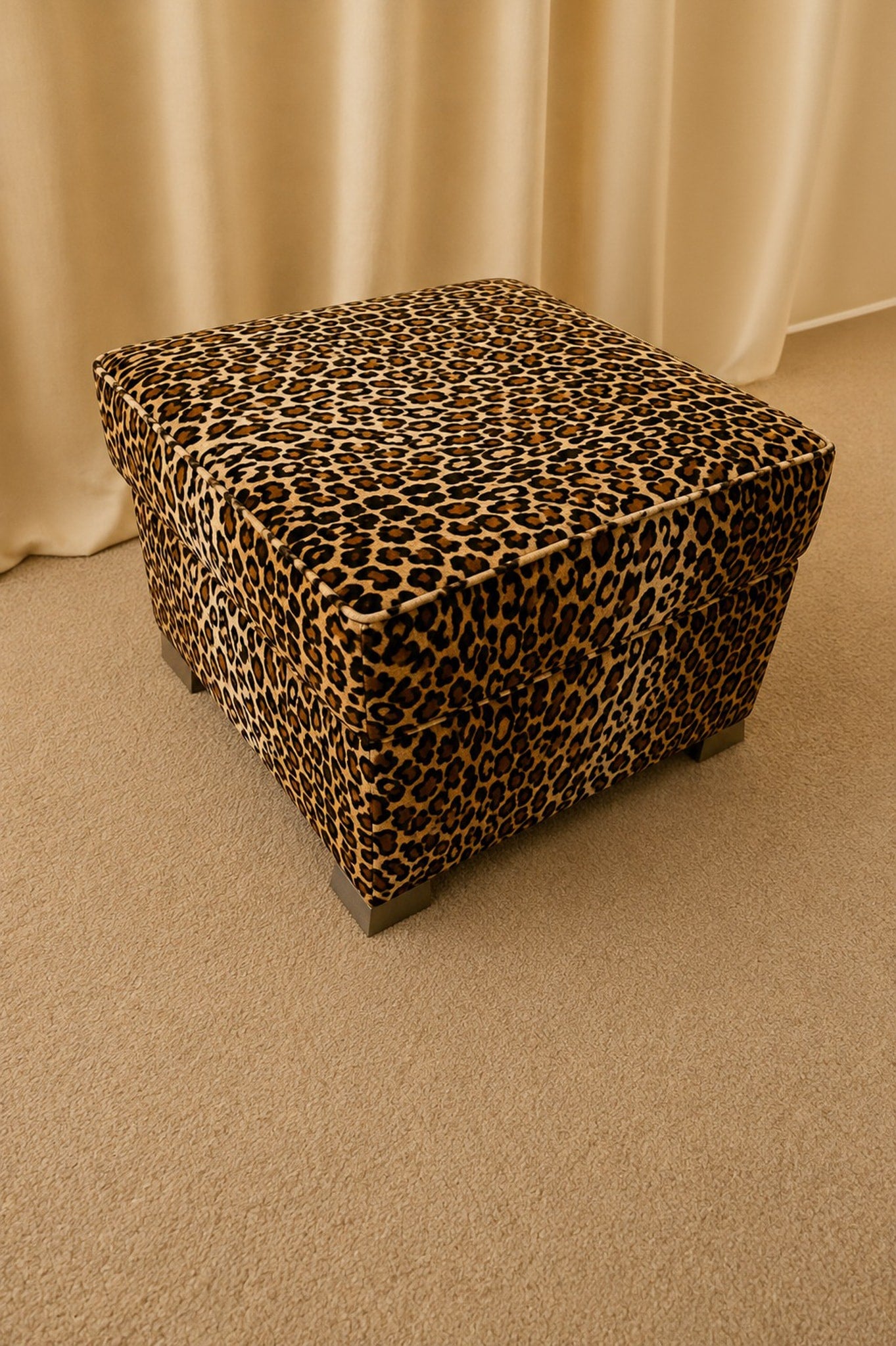 Pair of Leopard Upholstered Footstools — side angle