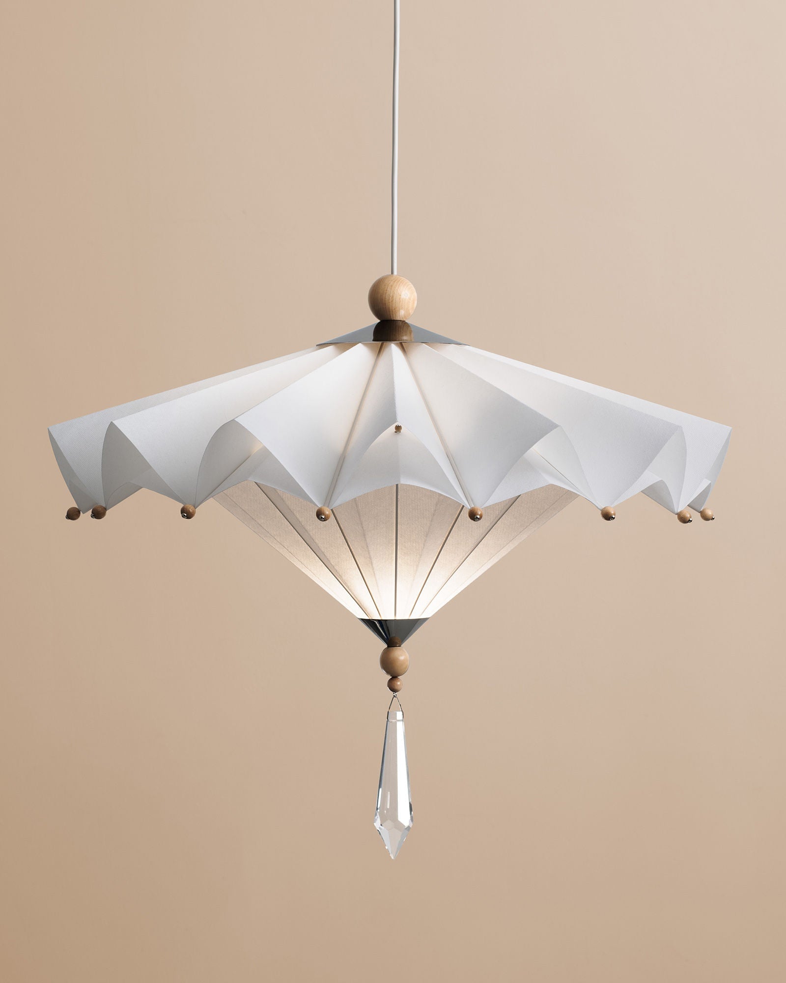 White pleated Harlequin pendant light with wooden accents by Elina Ulvio