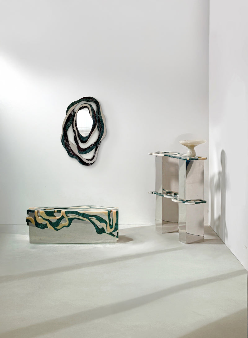 Orbis marble mirror with contemporary furniture in minimalist setting
