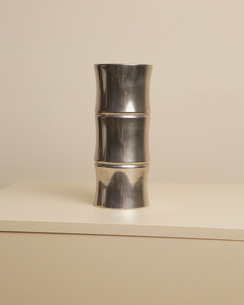 Three-tier polished aluminum vase with curved bamboo-inspired form
