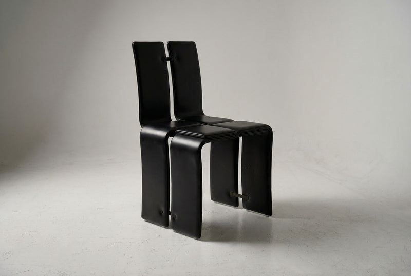 Weaving Chair - Leather — angled view highlighting black leather material