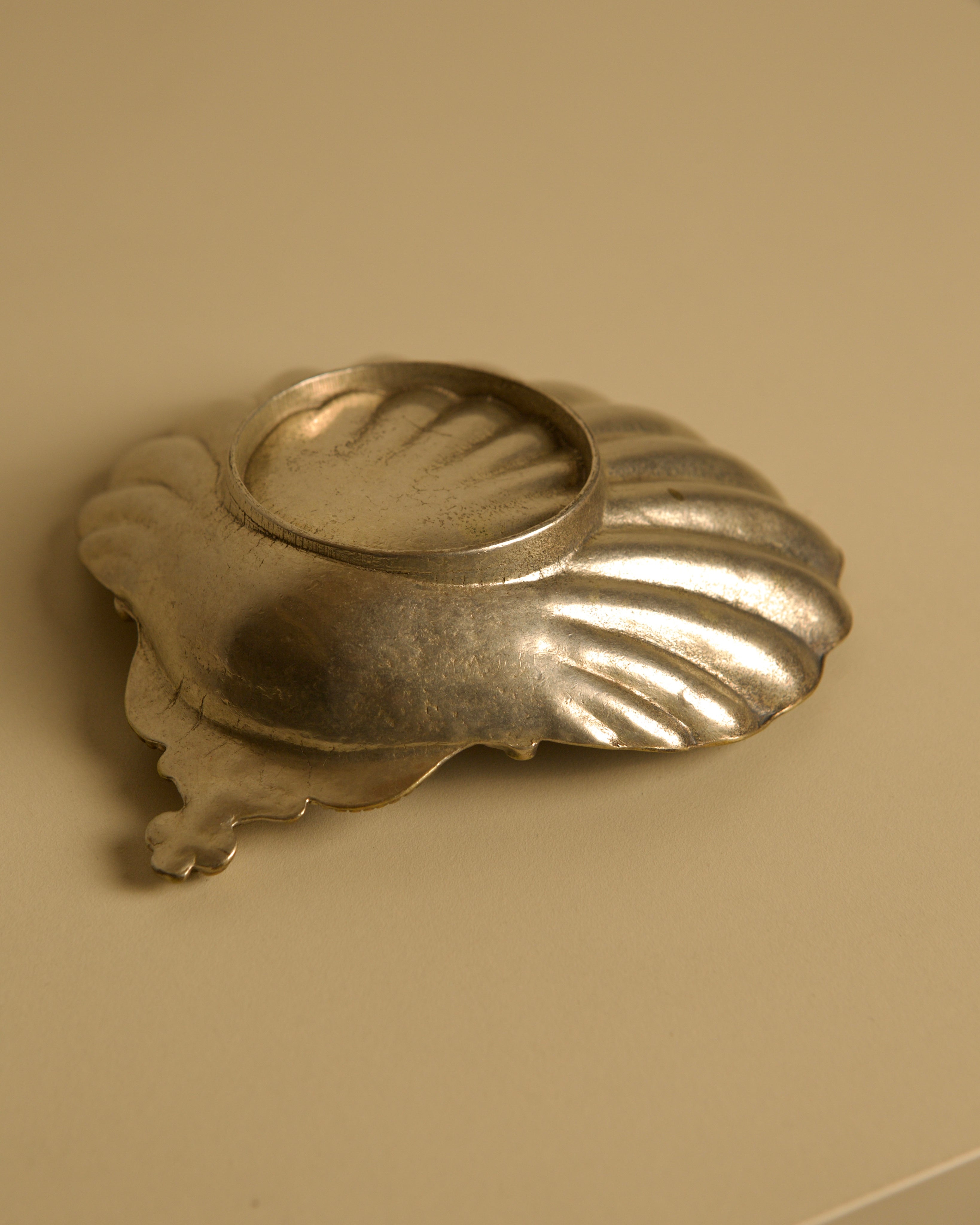 Italian Shell-shaped Vide-poches in Silver-plated Brass, 1950s — angled view highlighting shell design and texture