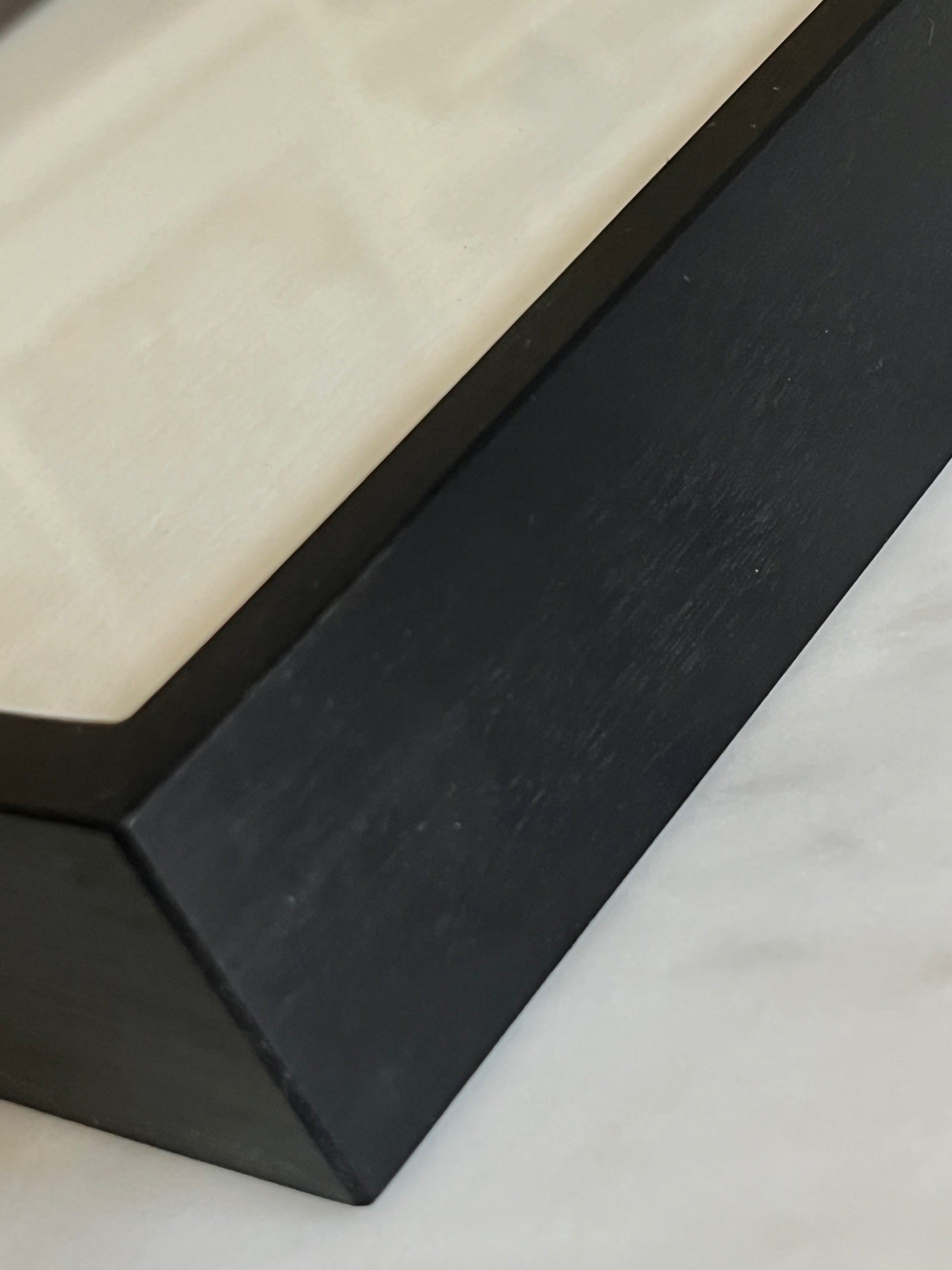 Antique Korean Fan in Frame — top view of black wooden frame