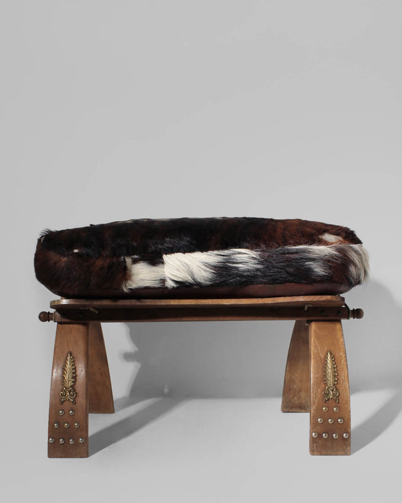 Cowhide Camel Saddle Stool by Vintage Stories | The Oblist