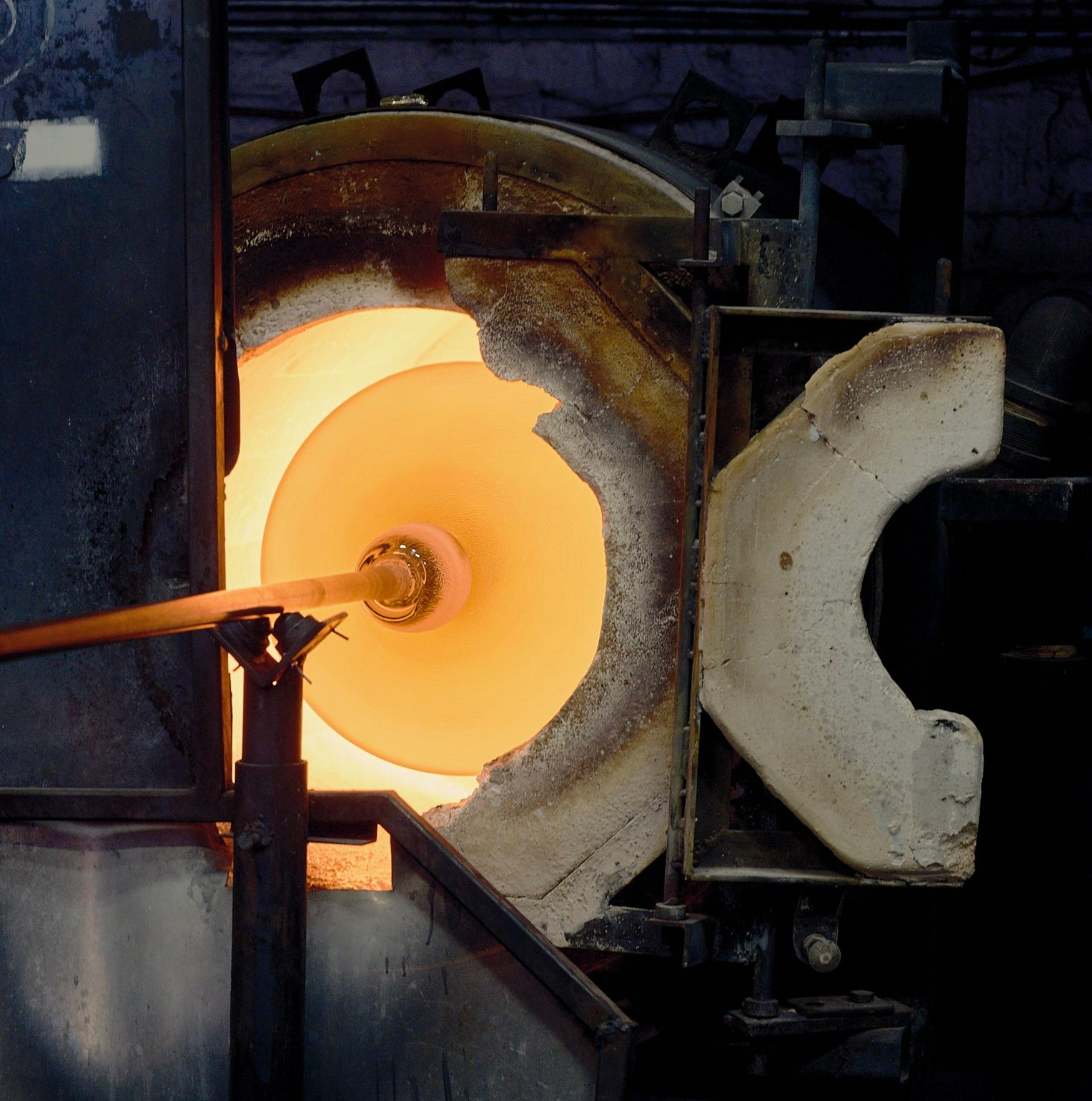 The Scavo Lamp — top view of glowing glass being shaped
