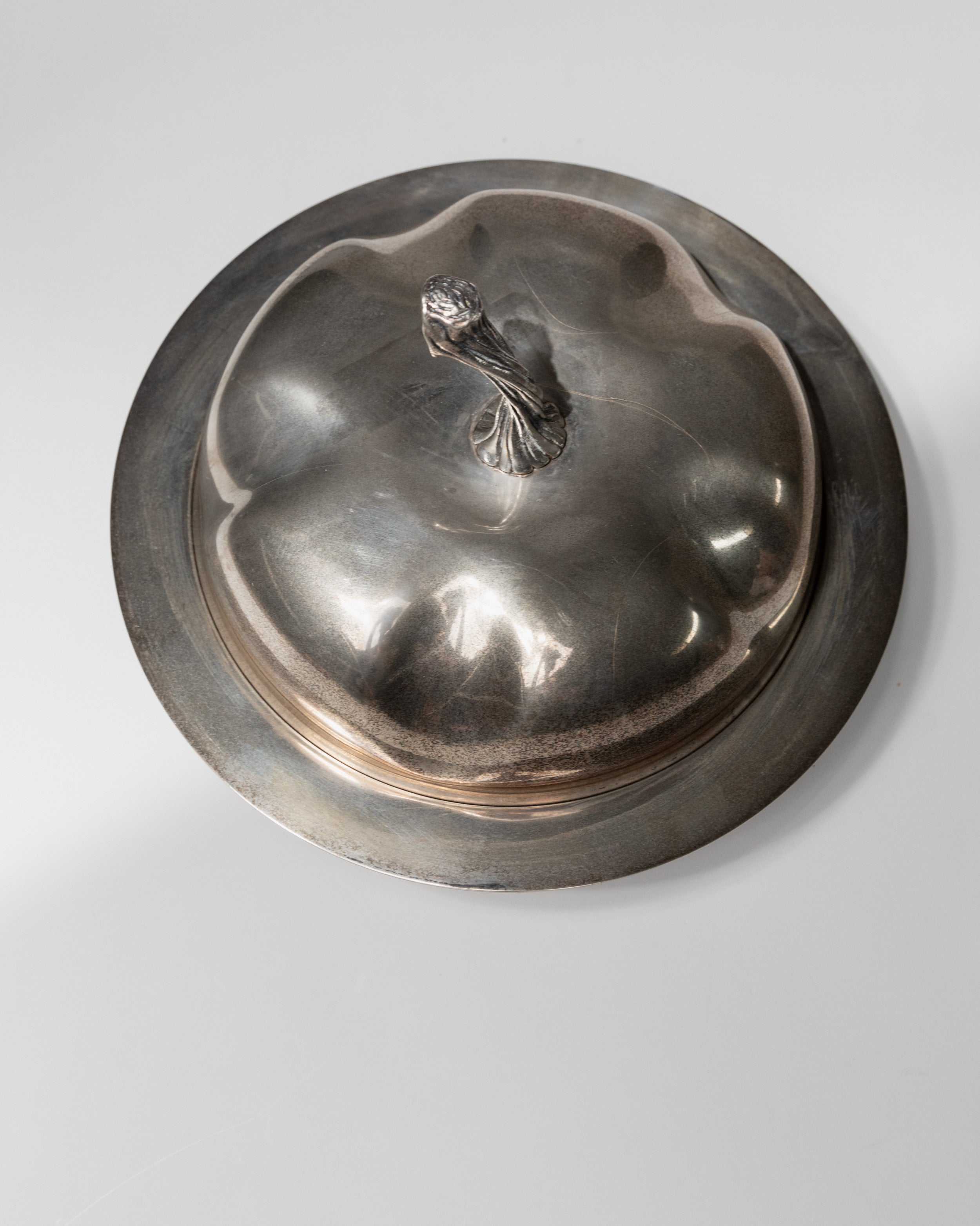 Silver plated bowl with domed lid and decorative finial, 1940s