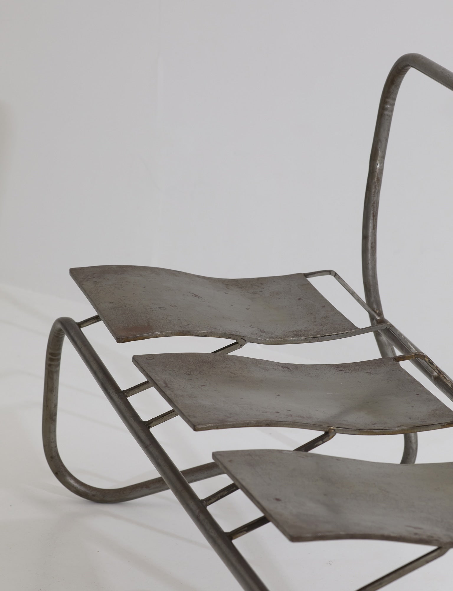 Unique Signed Artist Bench / Settee in Metal — back view of metal seat design