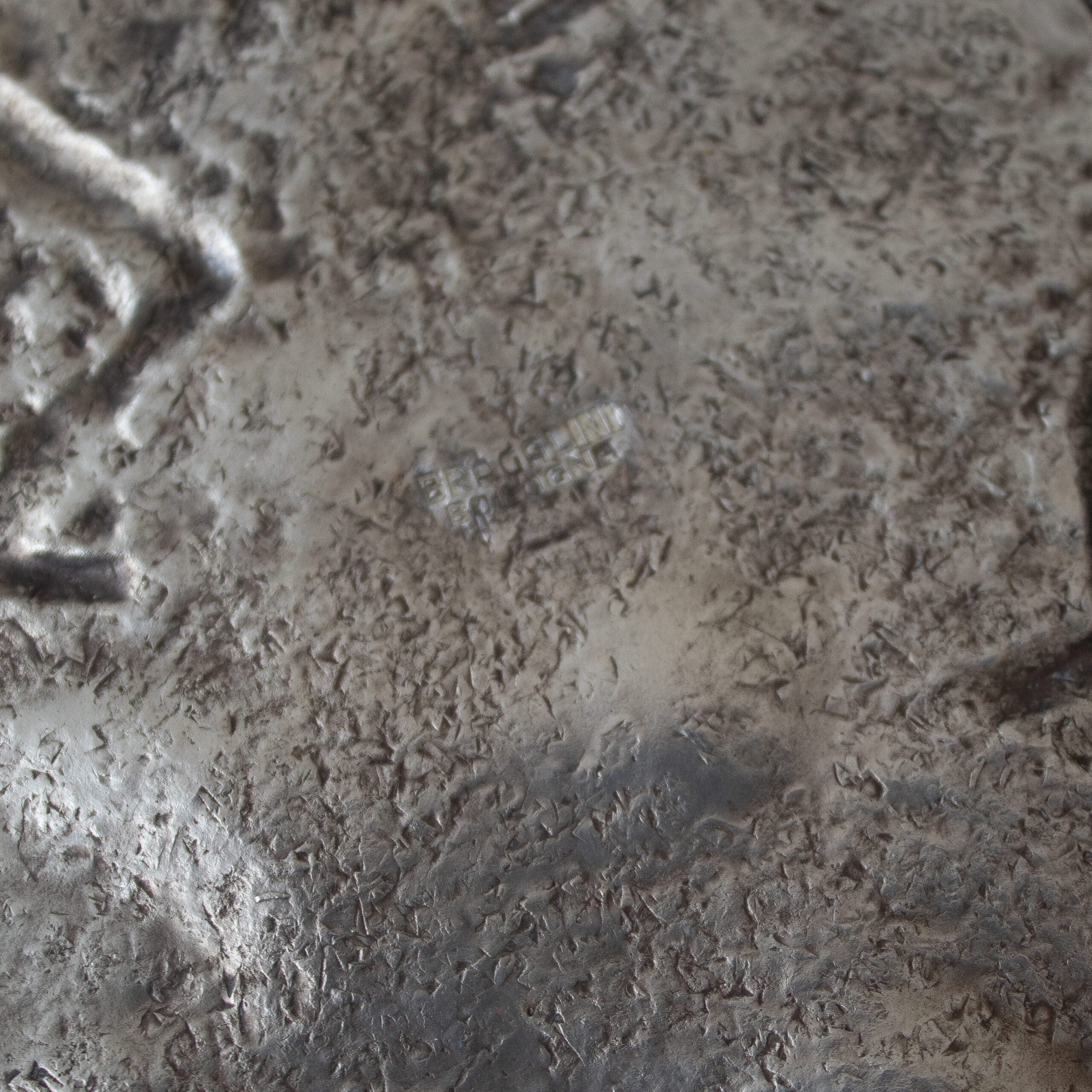 Bragalini Wall Art with Spiral Relief Motif in Hammered Metal — in context