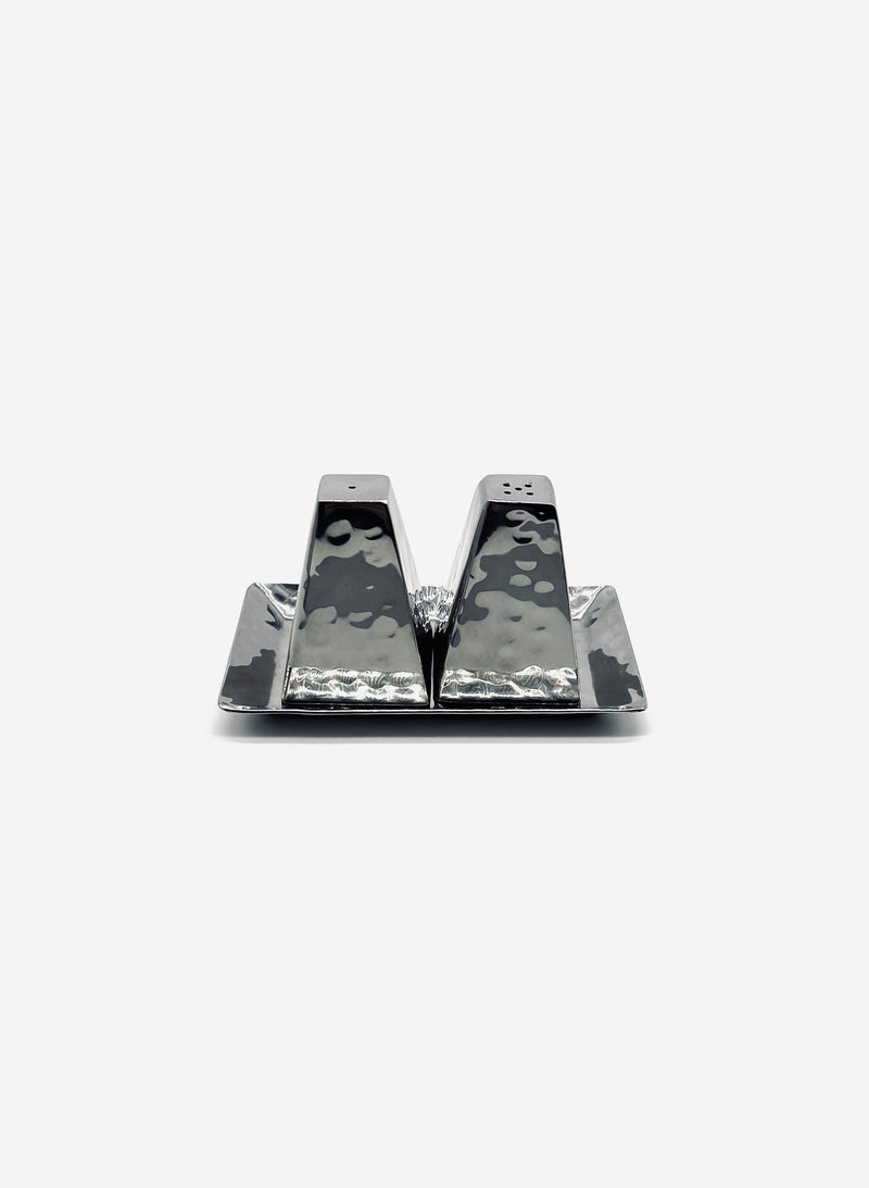 Vintage stainless steel salt and pepper shakers on matching tray