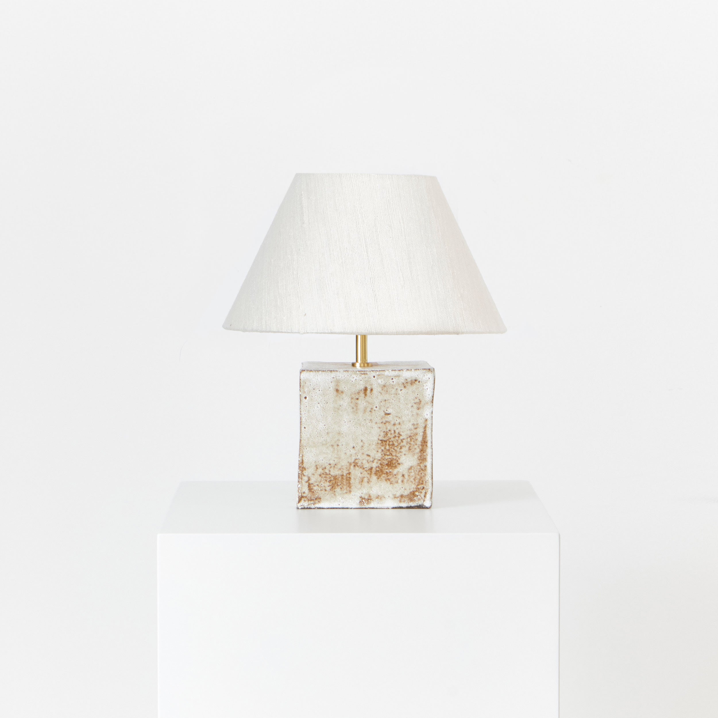 Arouca Table Light White — front view on white pedestal