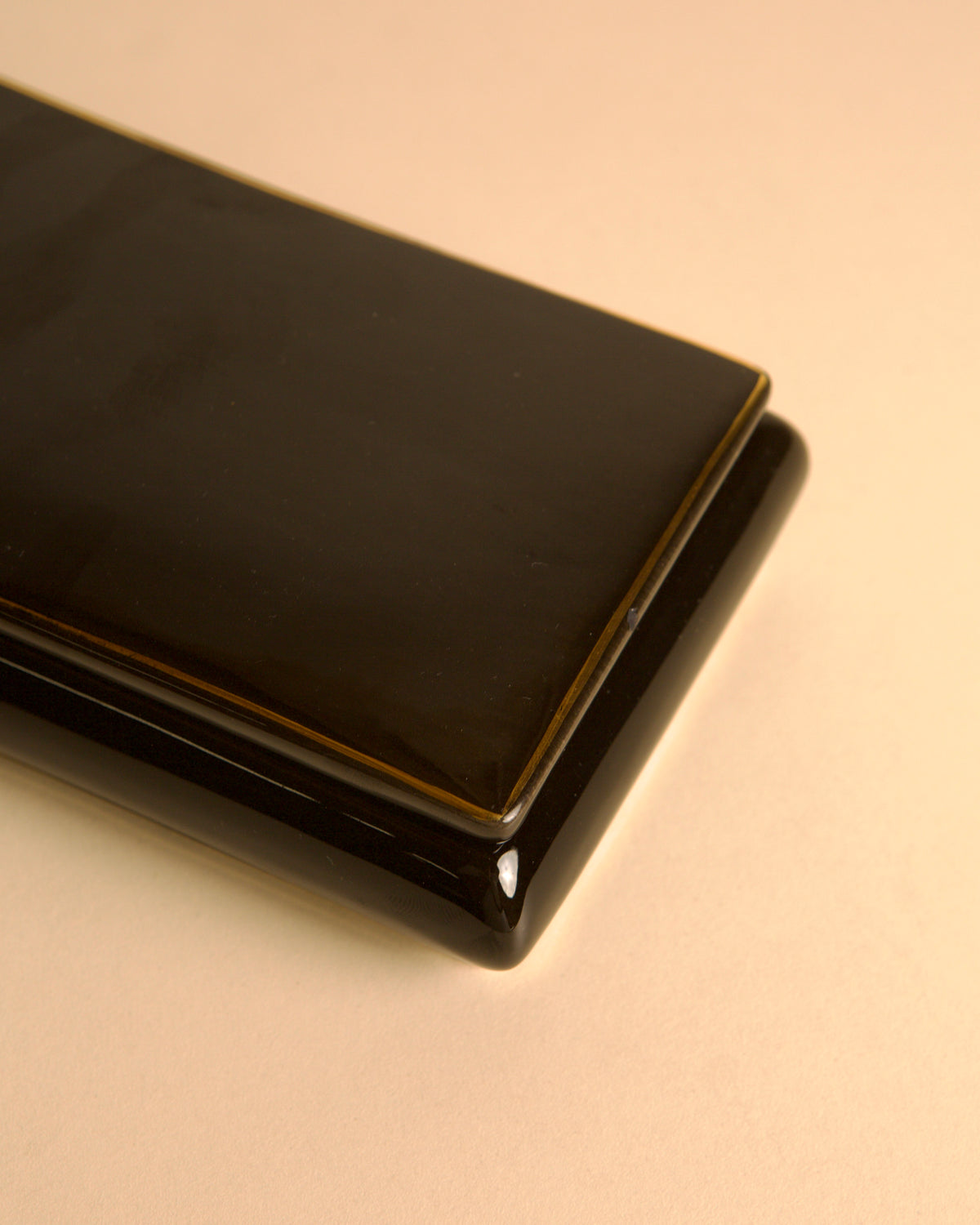 Italian black and gold ceramic box, 1960s — lifestyle setting