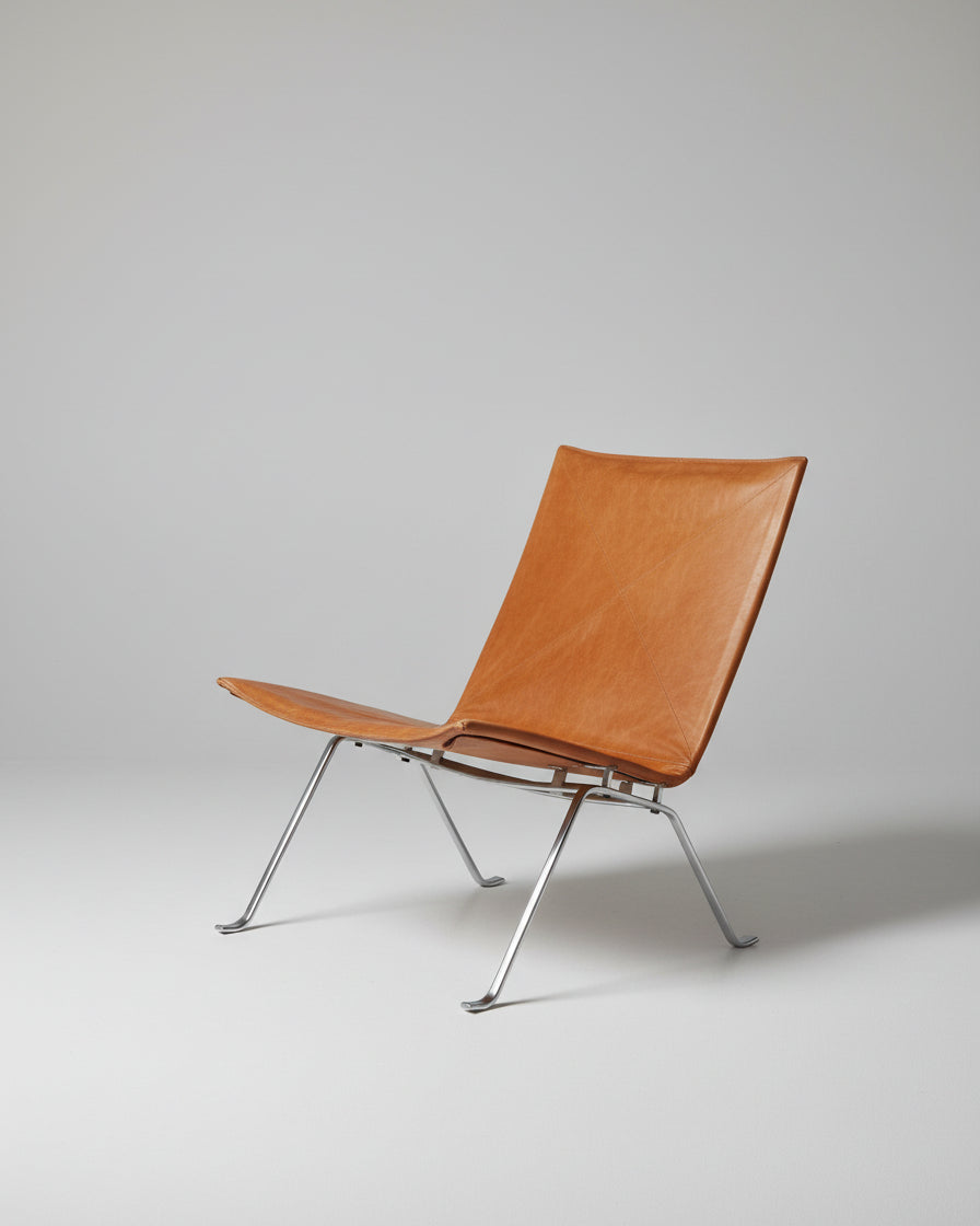 PK22 leather armchair with steel frame by Poul Kjærholm