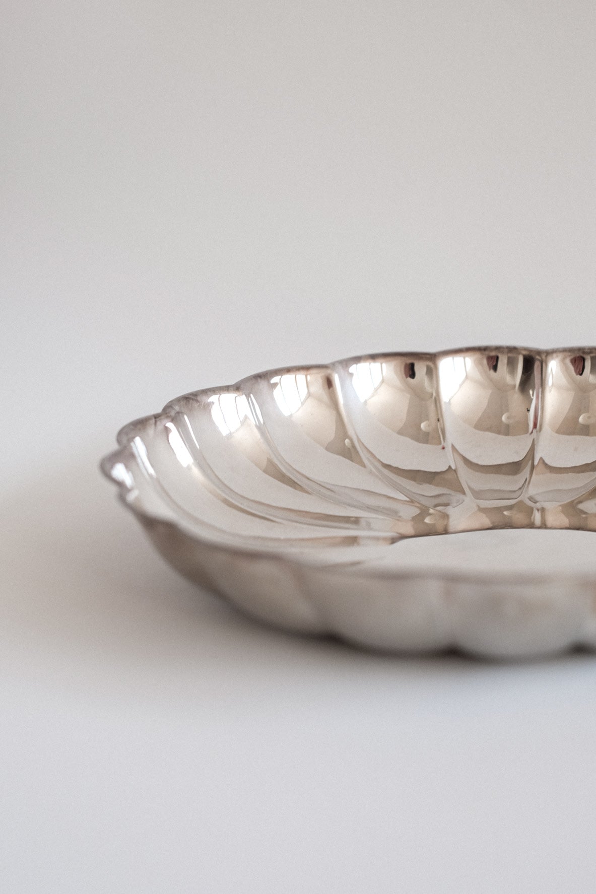 Silver-Plated Dish — angled view highlighting reflective surface