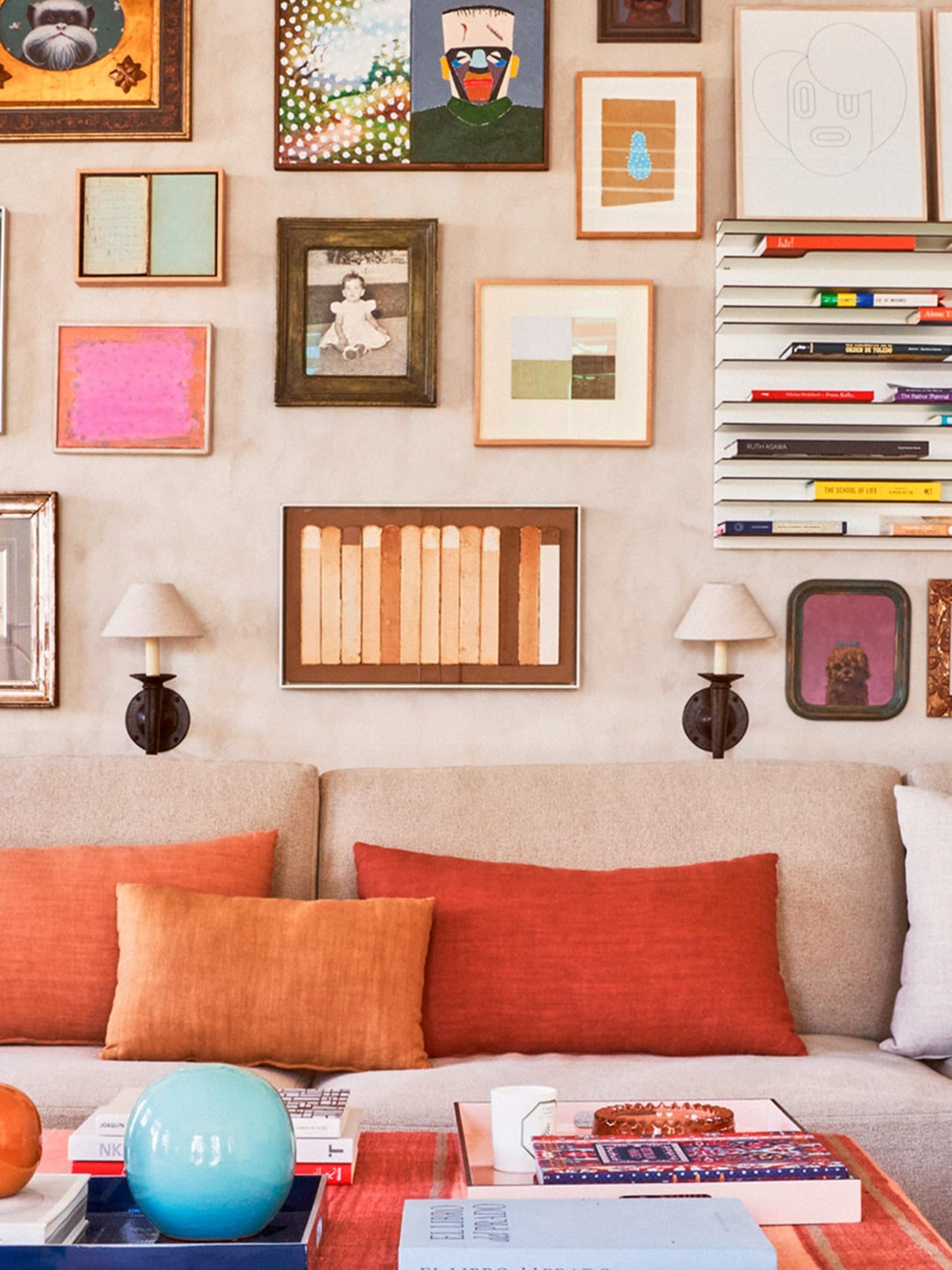 Hand-Torch Wall Light — side view mounted on textured wall above sofa