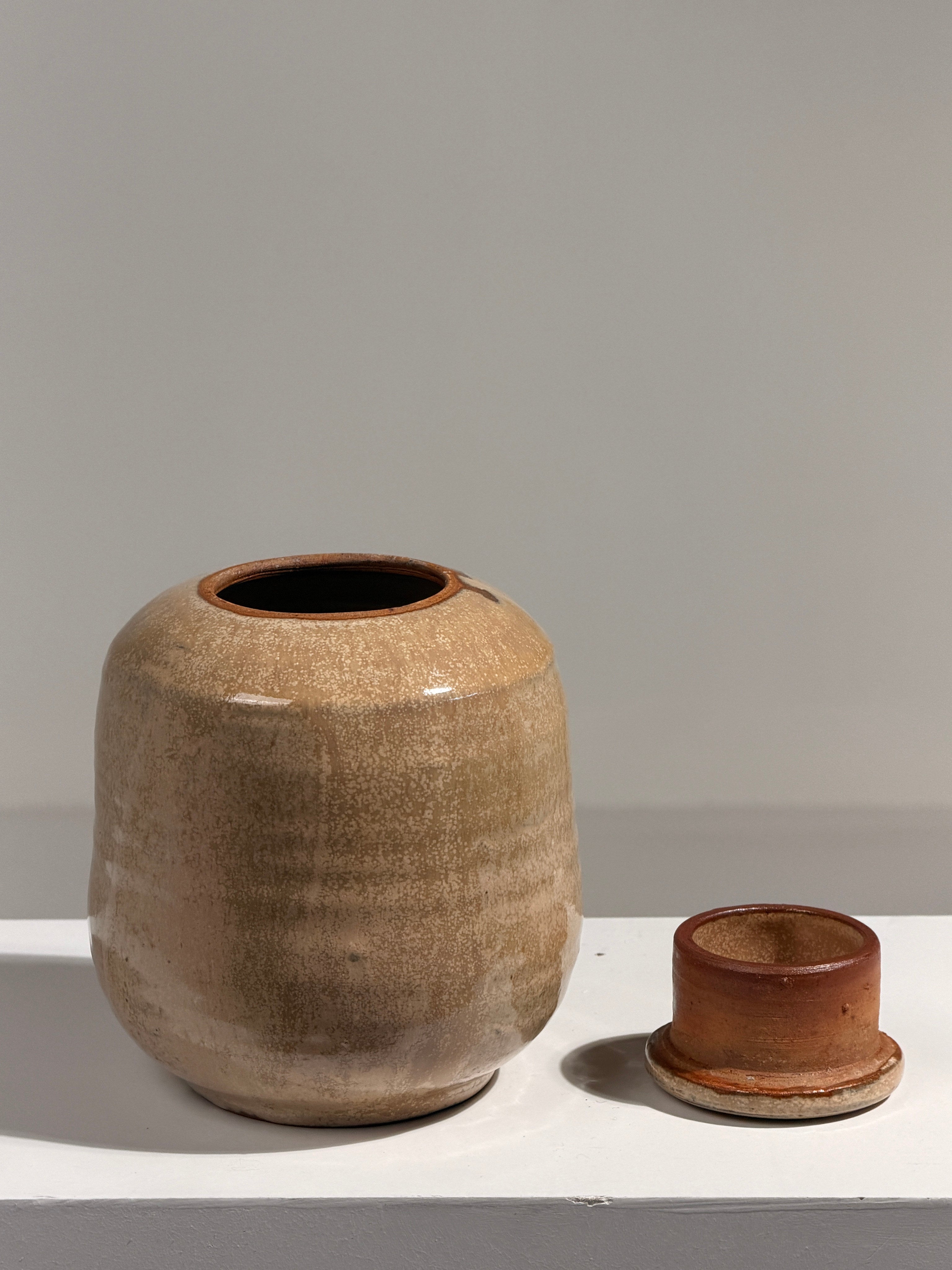 Lidded stoneware pot, French work, circa 1970 — side angle