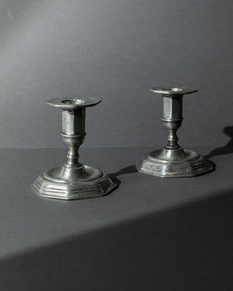 1900s Pewter Candleholders Set of 2 — close-up of antique pewter finish
