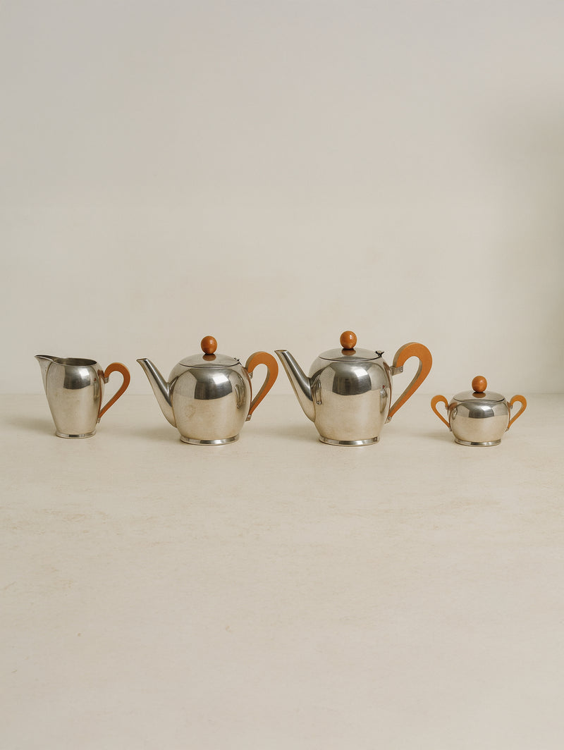 Art Deco stainless steel tea coffee set with orange handles