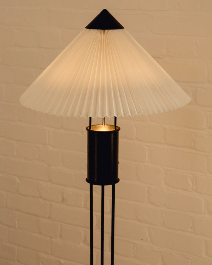 Le Klint Floor Lamp — close-up of pleated white shade and metal base