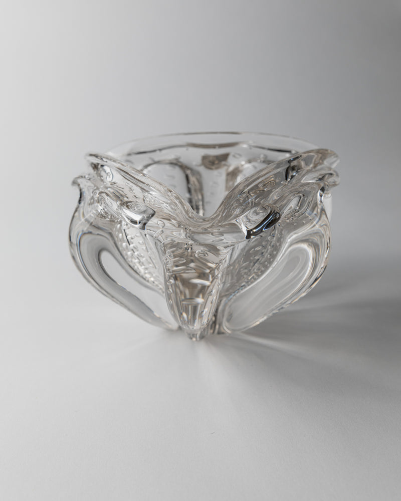 Clear Murano glass bowl with sculptural curved edges and flowing design