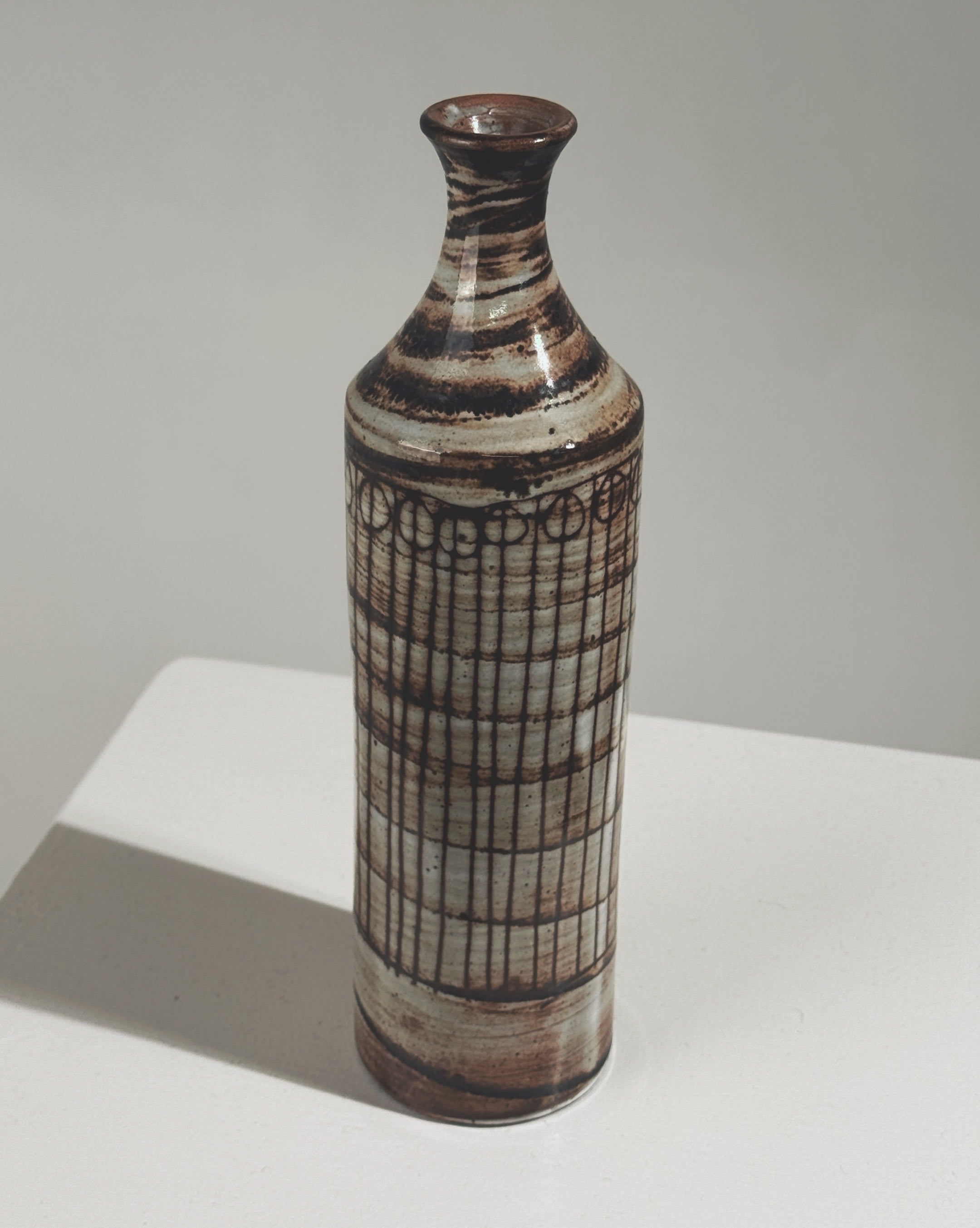 Ceramic soliflore vase by Jacques Pouchain with grid pattern detail