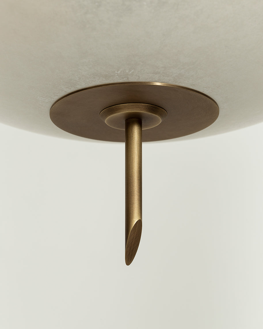 "COSMOS" Chandelier in alabaster and antiquated brushed brass — lifestyle setting