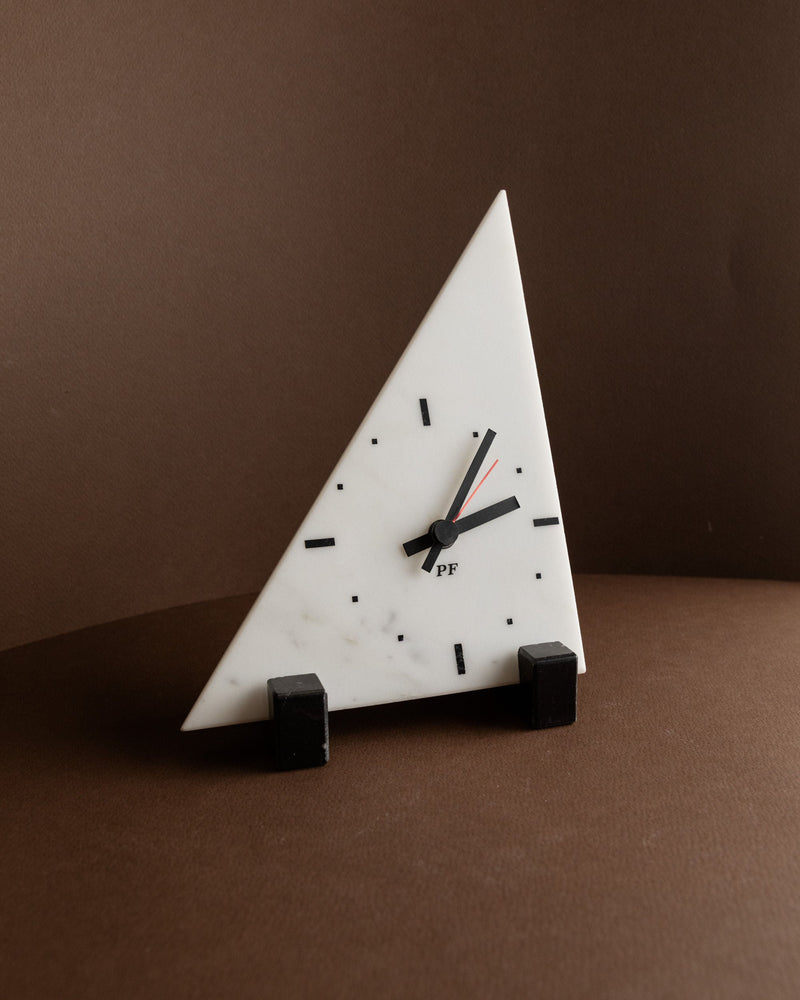 Marble Clock in Memphis style by PF - 1980s — close-up of triangular white marble face