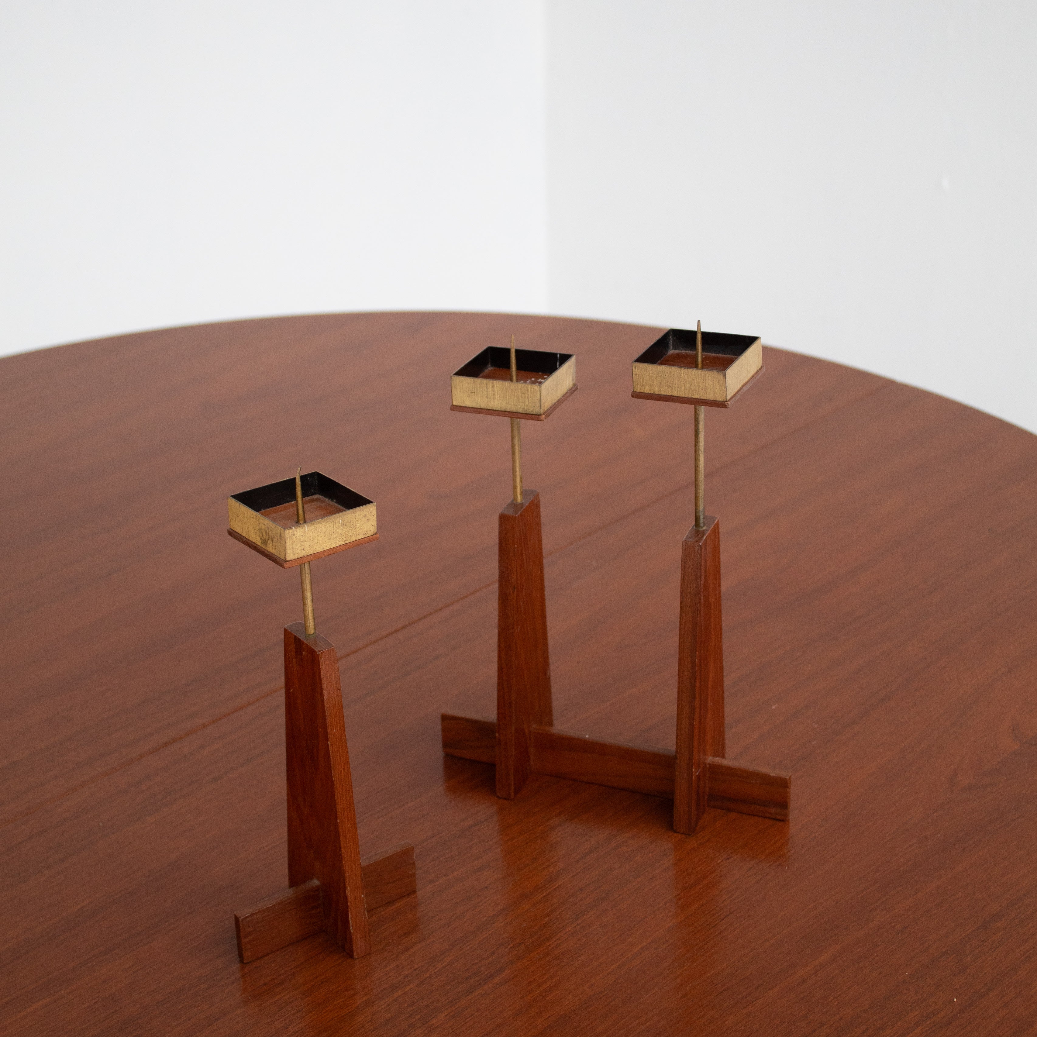 Vintage Candle Holders in Wood / Teak — side angle on wooden table