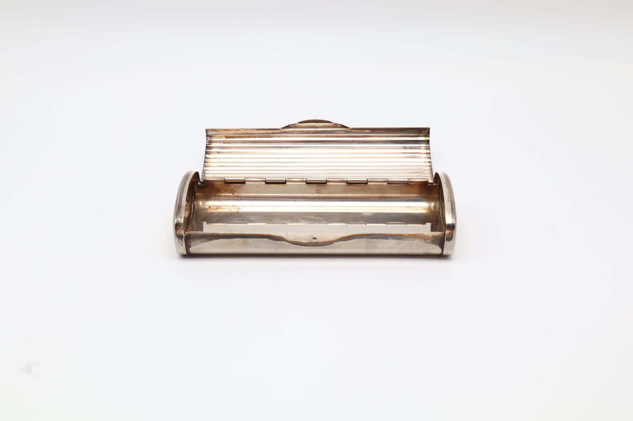 Vintage Ribbed Sterling Silver-plated Case – France, c. 1930–1950 — lifestyle setting