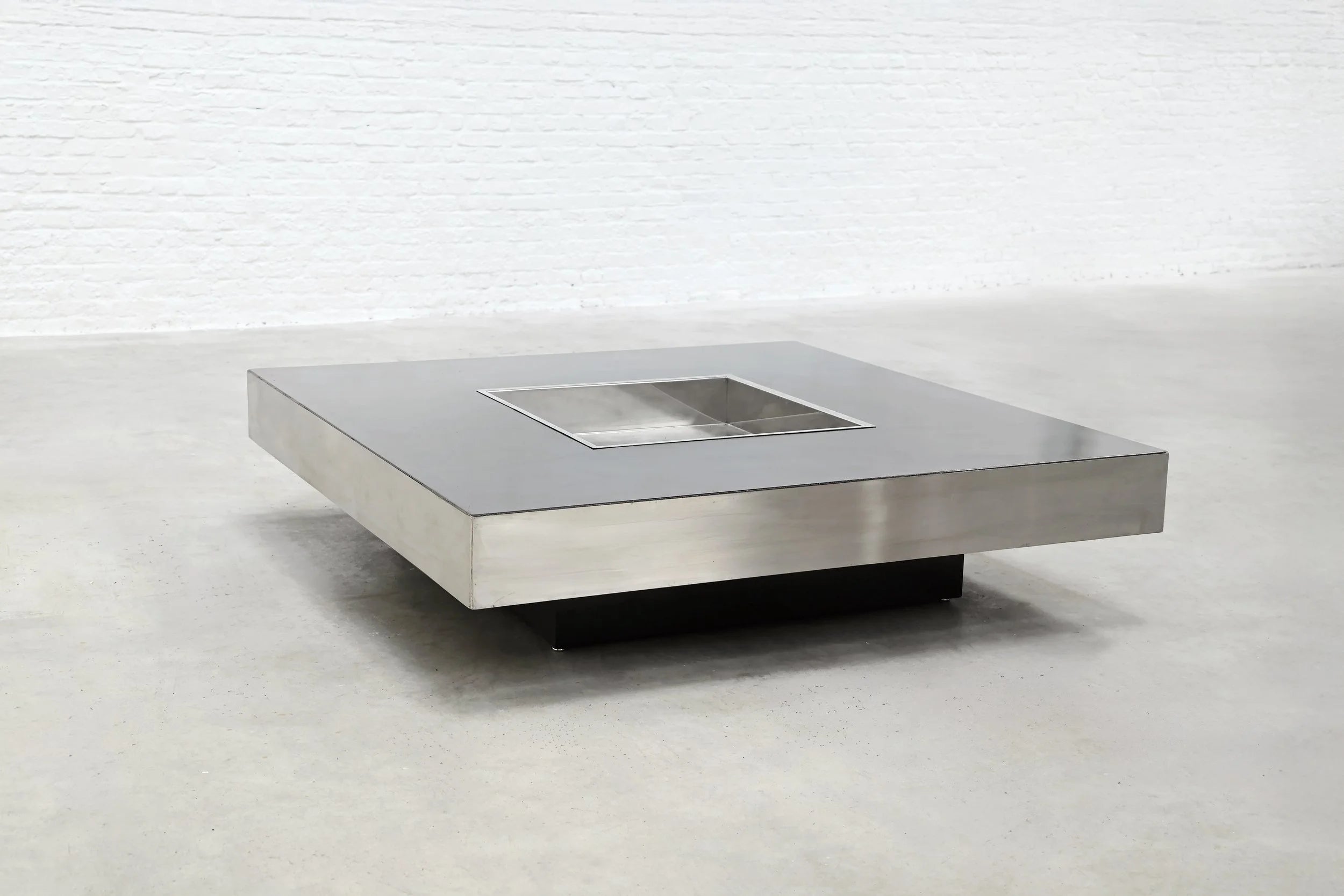 Chrome Coffee Table, 1970s — top view of chrome surface in minimalist setting