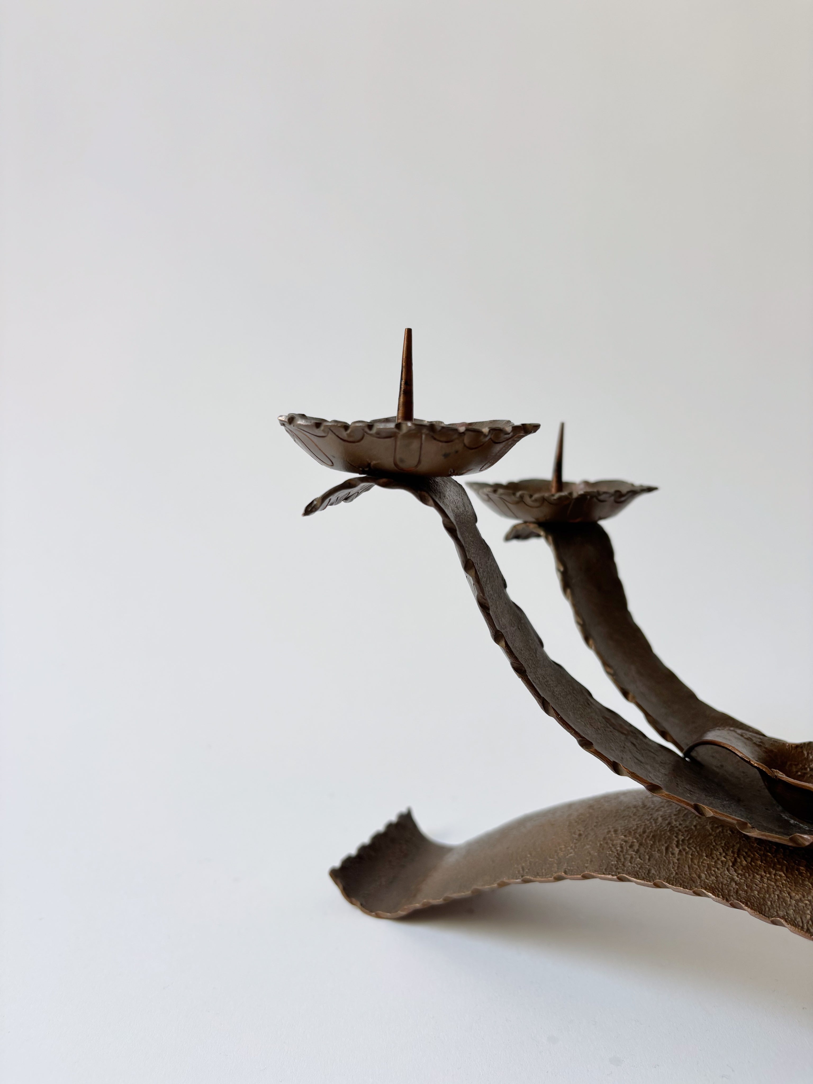Large Metal Curved Artisan Candlestick, Poland — top view highlighting handcrafted metal design