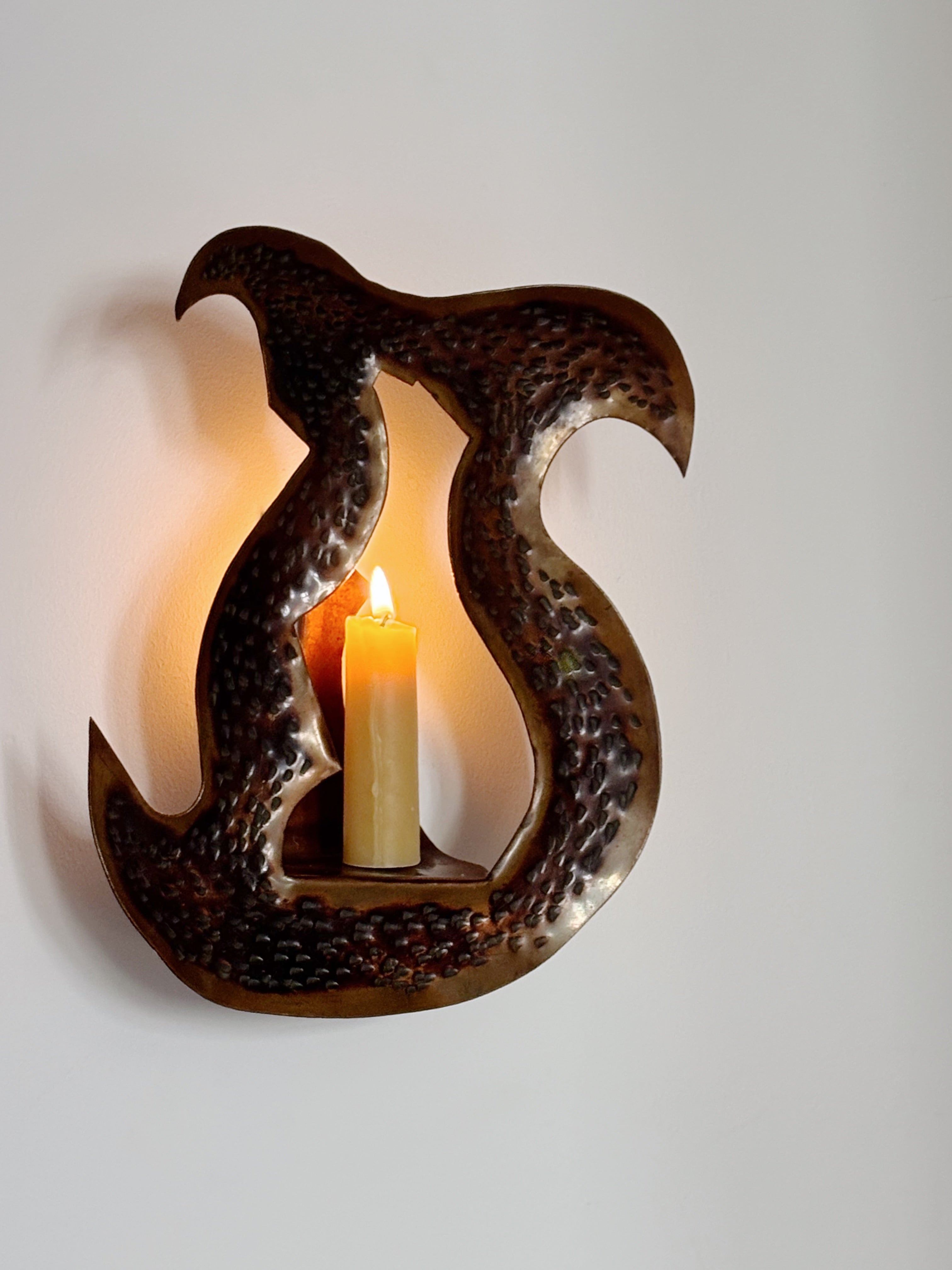 Pair of Torch Cut Metal Wall Candleholders, Poland — in context