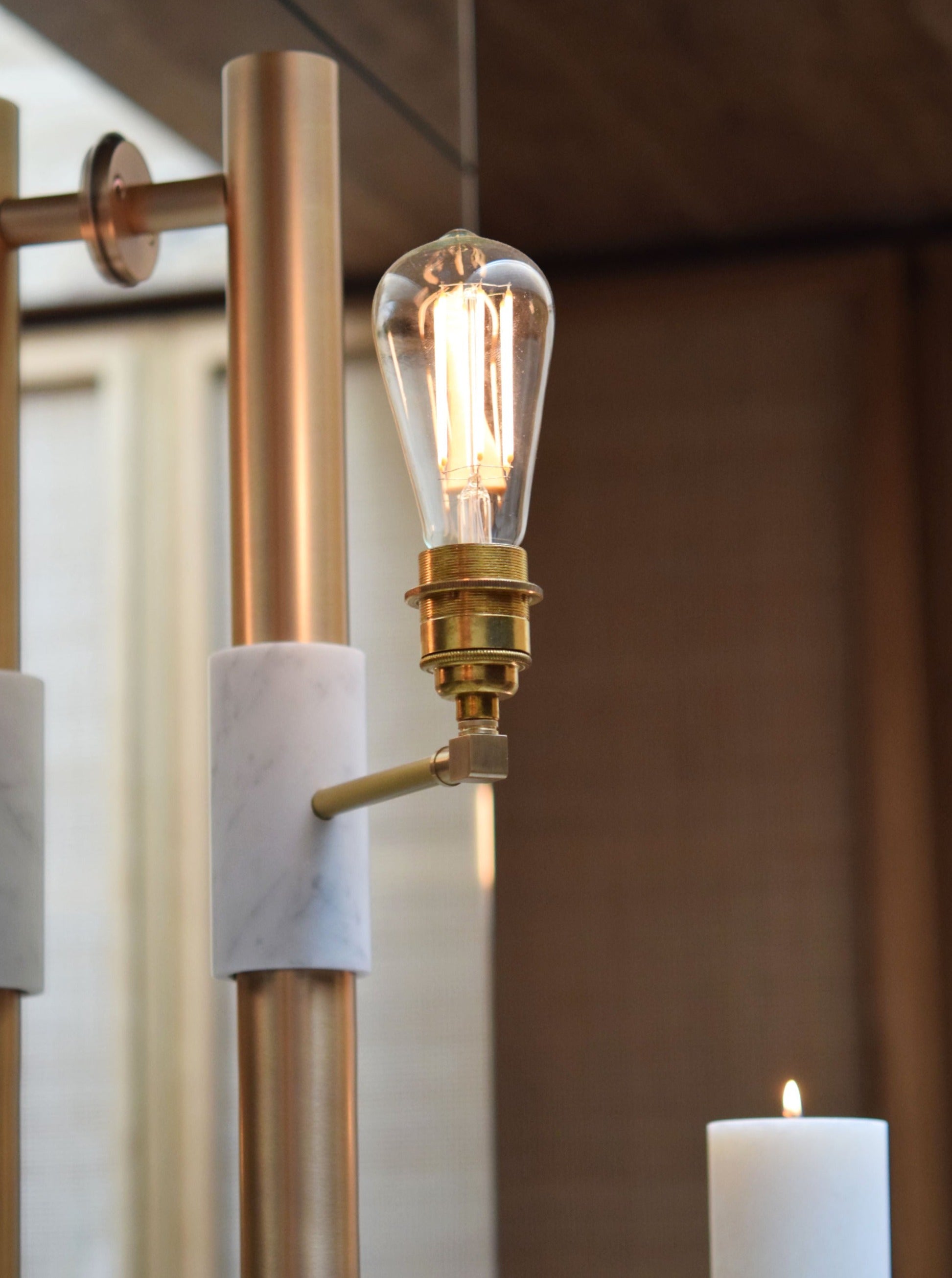 Amaterasu Wall Lamp — close-up of brass and marble materials