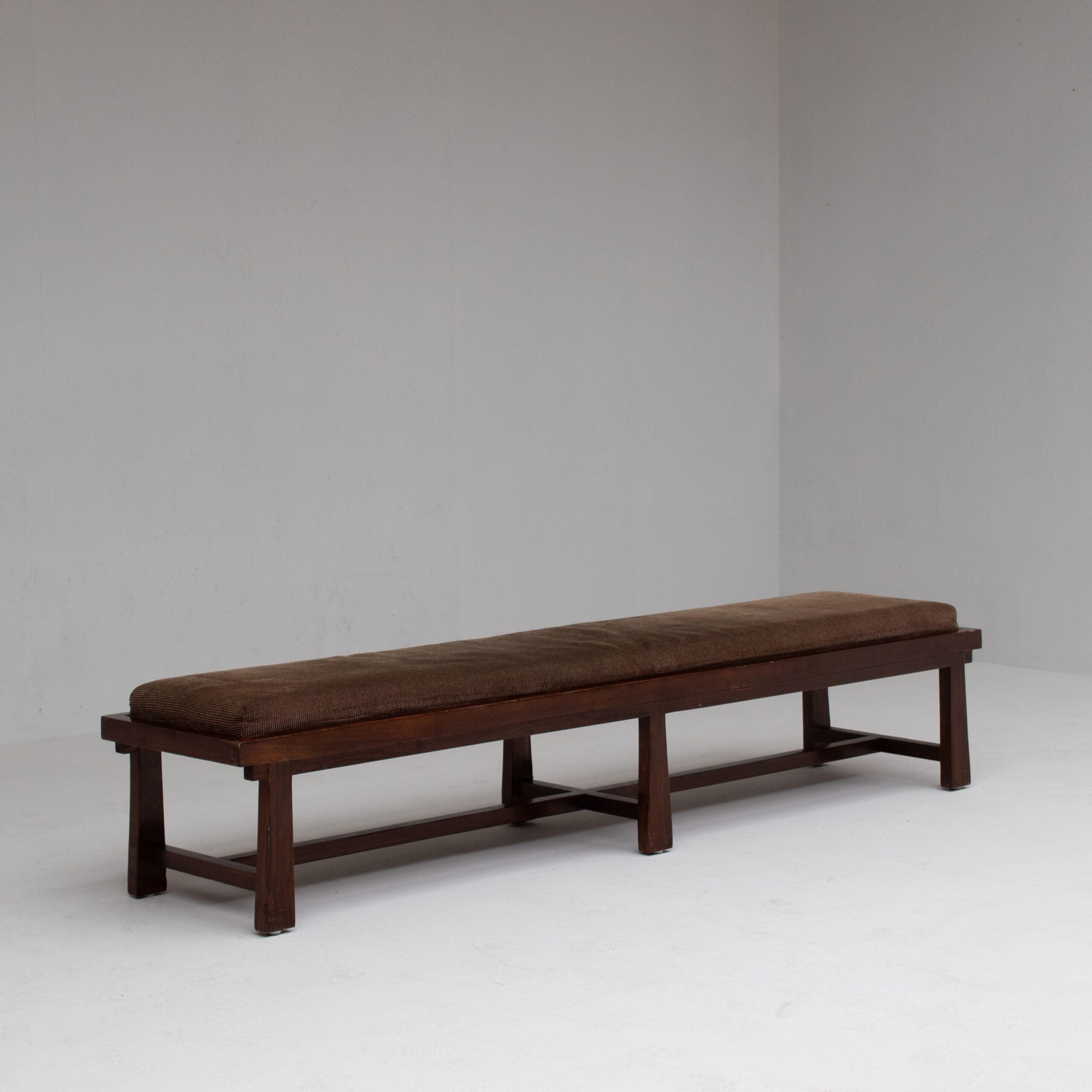 Rustique Bench in Wood with Cushion — top view of dark wooden frame and cushion