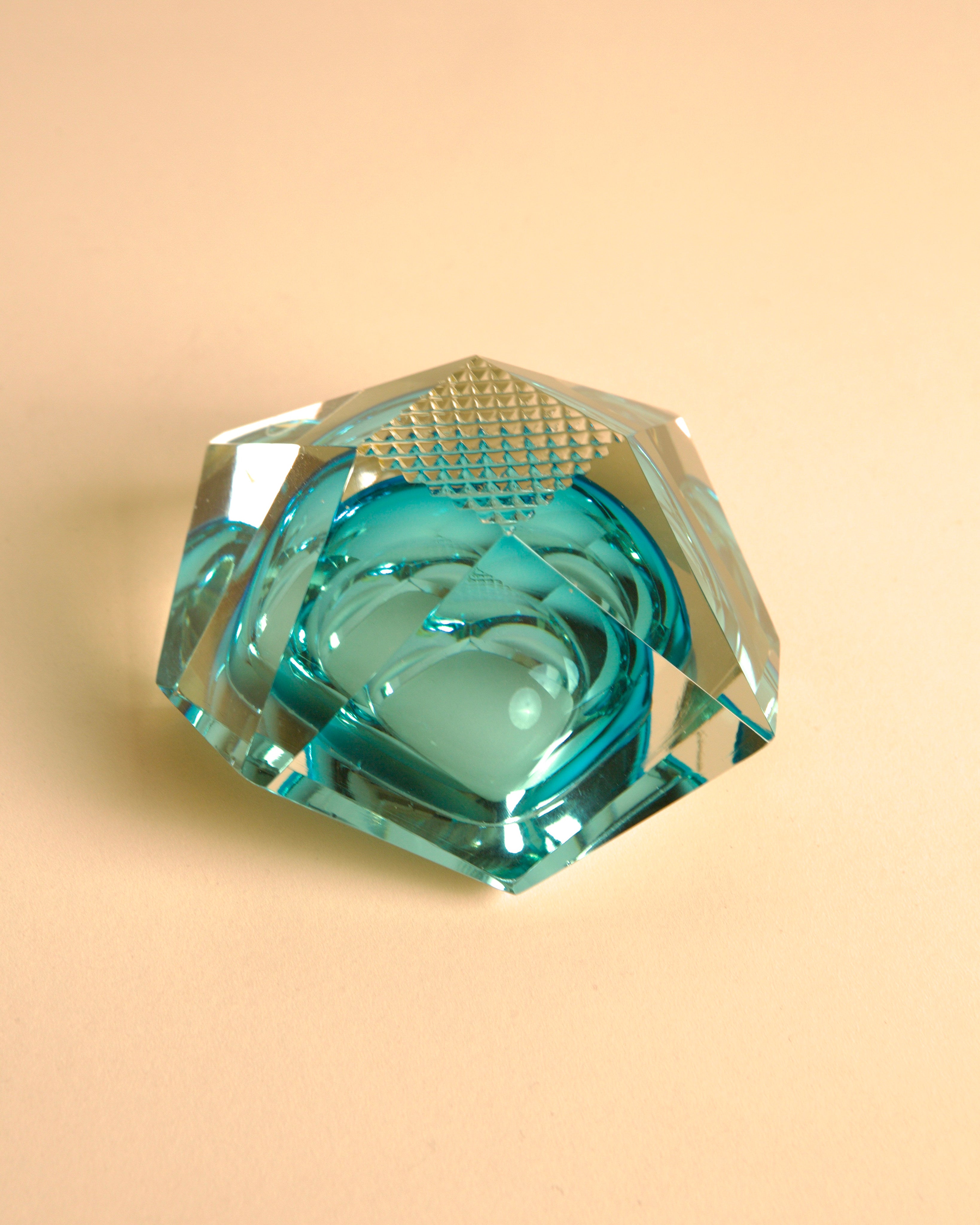 Turquoise Murano Glass "Diamond" Ashtray by Flavio Poli — angled view on soft background