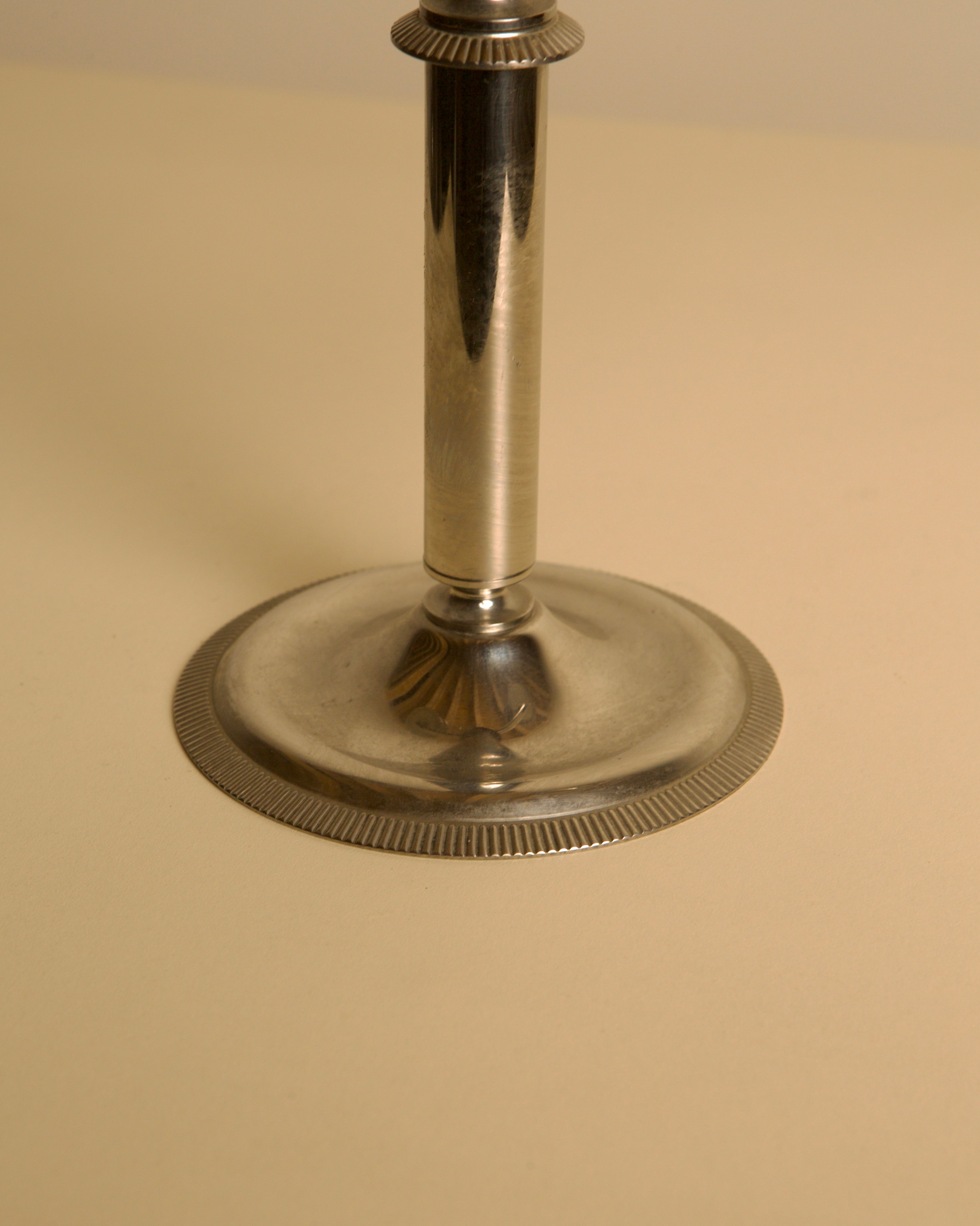 Italian "Duo" Candleholder in Silver Metal 60's — close-up of polished silver base