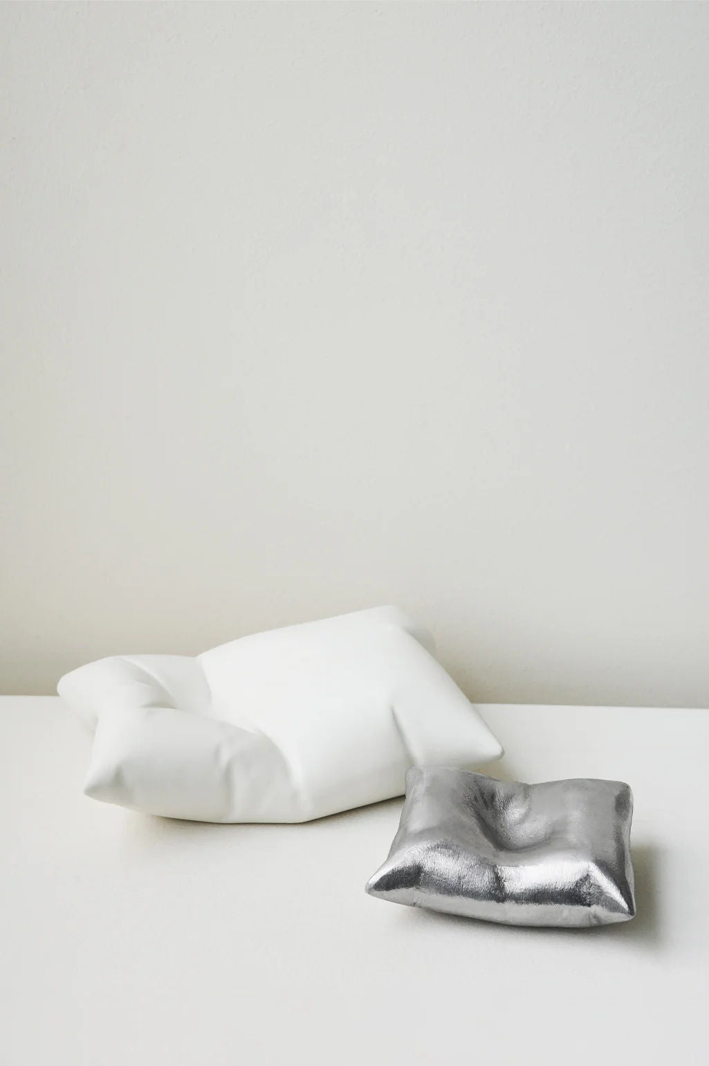 Bumped - Aluminium Cushion in Silver — side angle