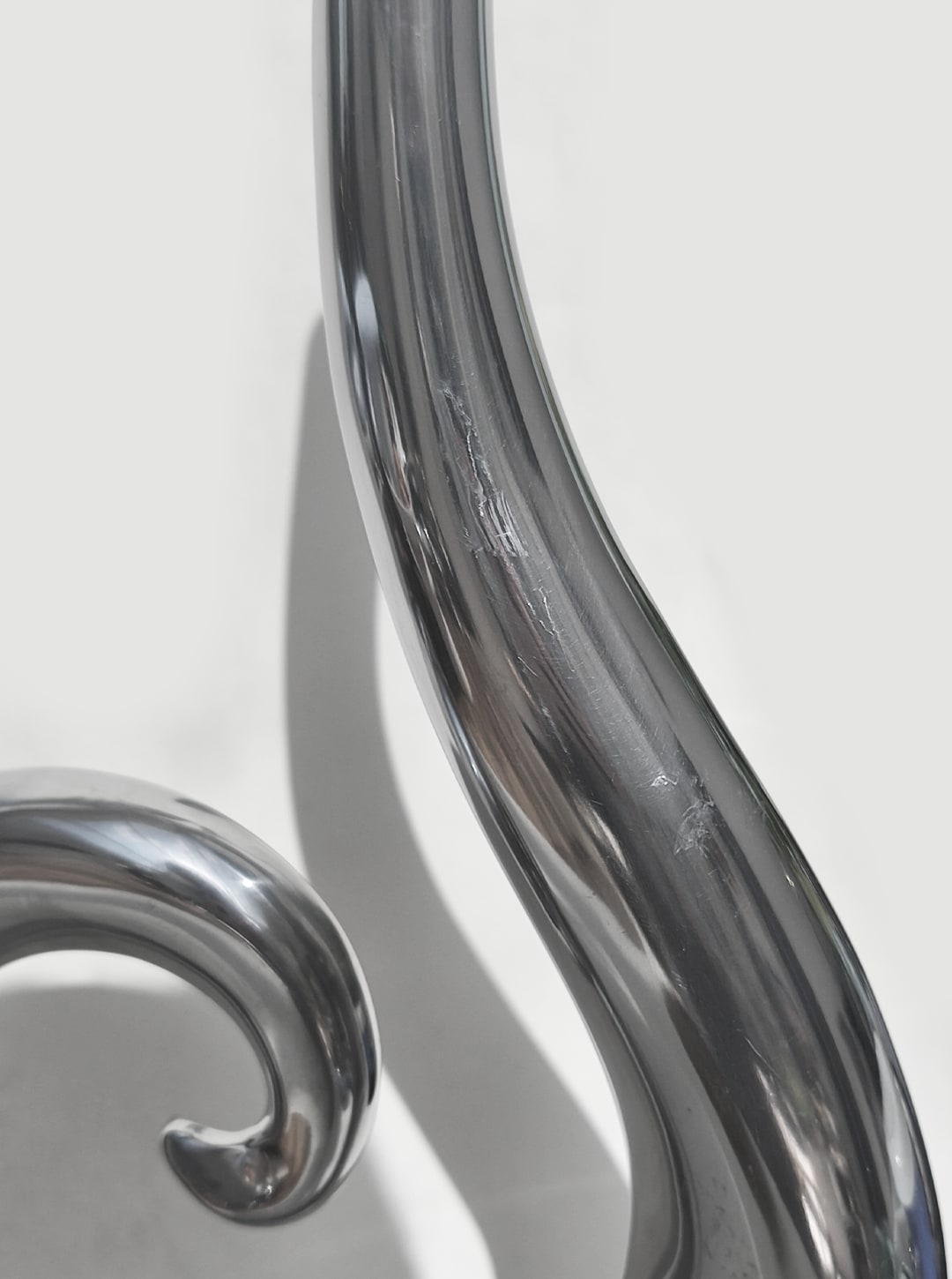 Large Spiral Vase — close-up of polished metal surface