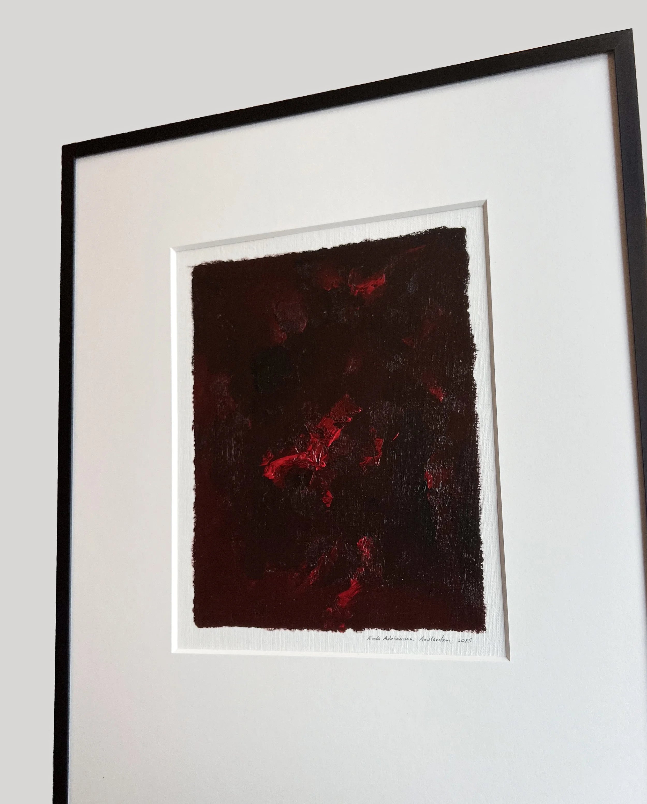 Oil painting on paper - 11 (2025) — side angle showing deep red tones in frame