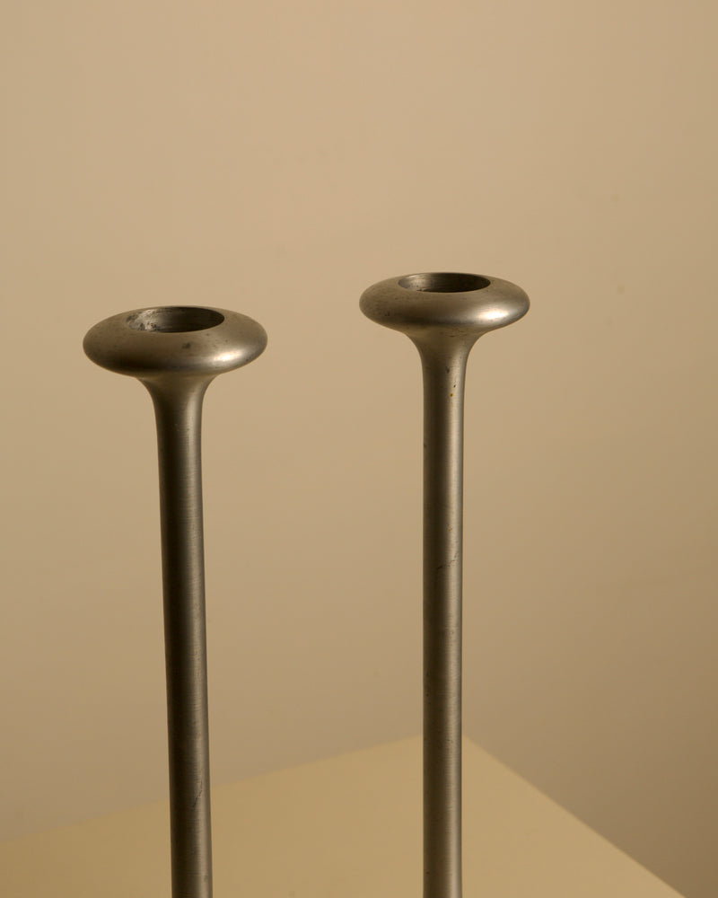 Pair of 80s Cast Aluminum Candleholder — close-up of metallic finish and shape