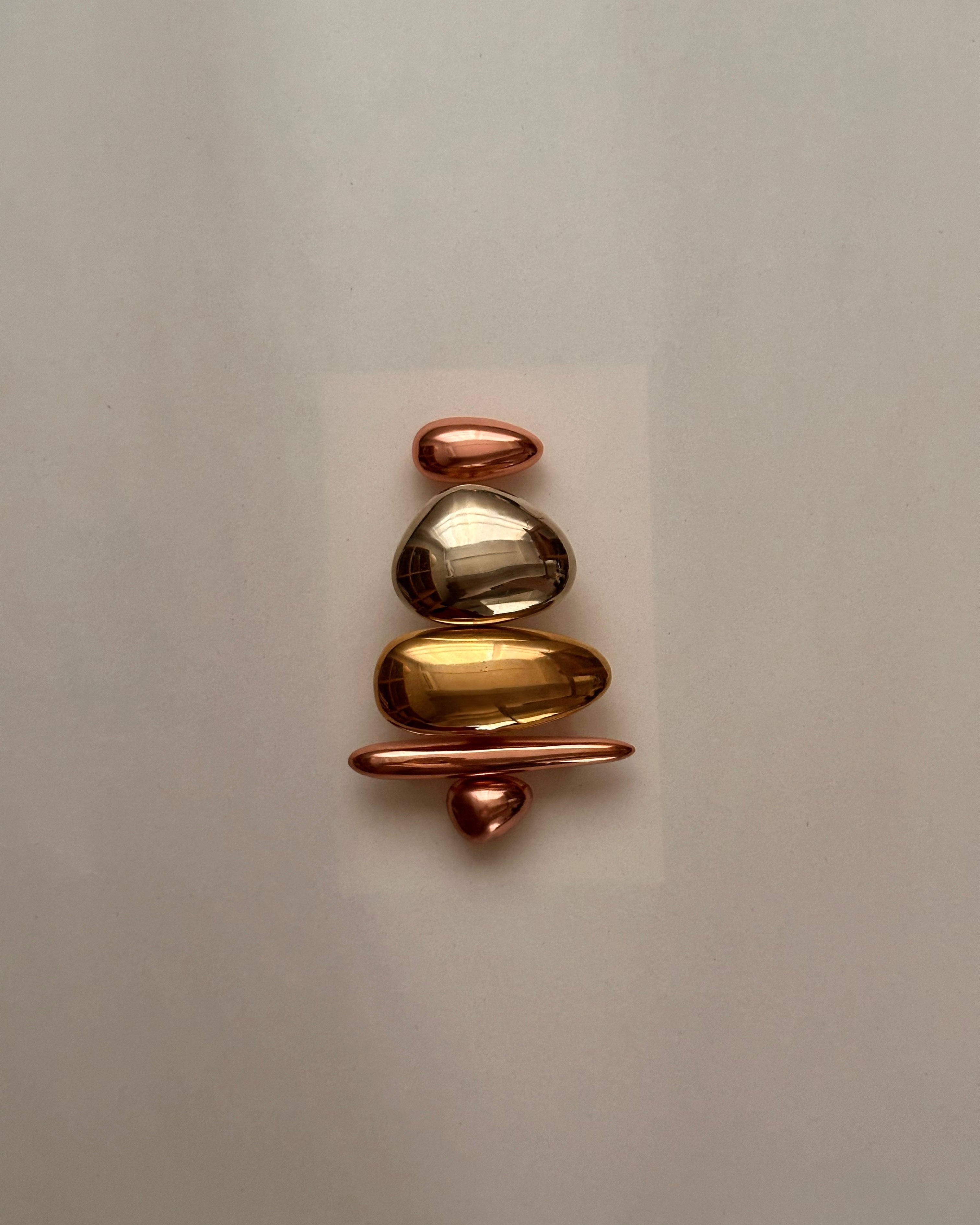 MOMI Cabinet Knob/Wall Hook Short — close-up of polished metallic finish