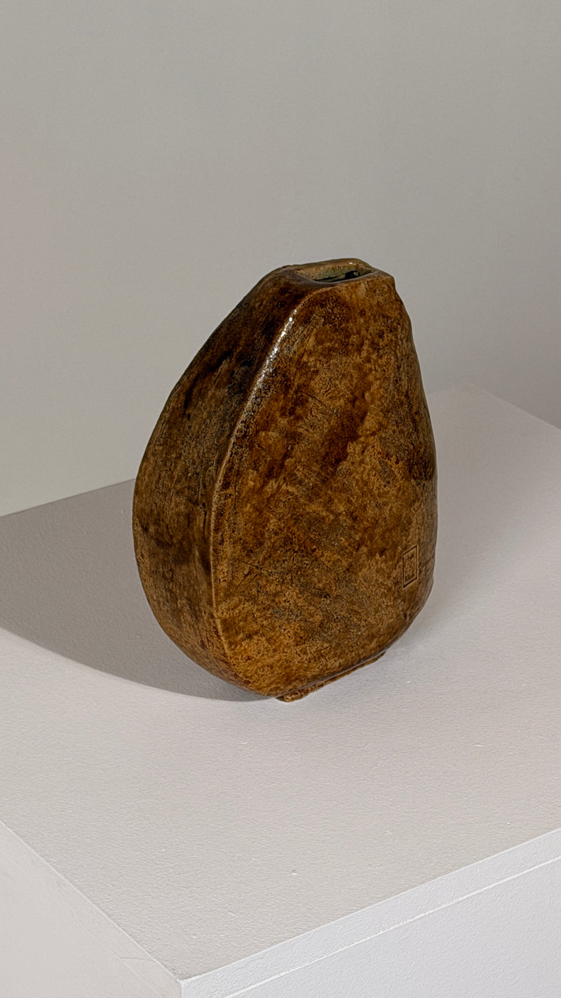 Stoneware Vase, attributed to Antoine de Vinck, Belgium, 1970 — close-up of textured brown surface on white pedestal