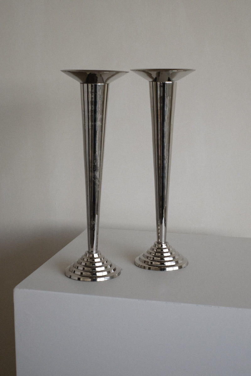Art Deco Candle Holders — close-up of polished metal finish