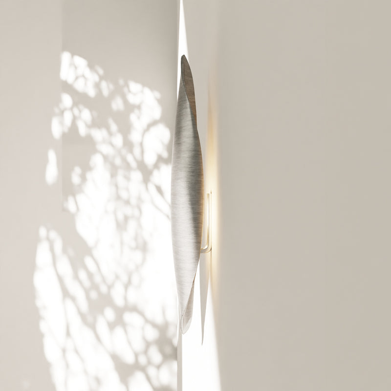 Plume Applique | Aluminum — side view against light wall