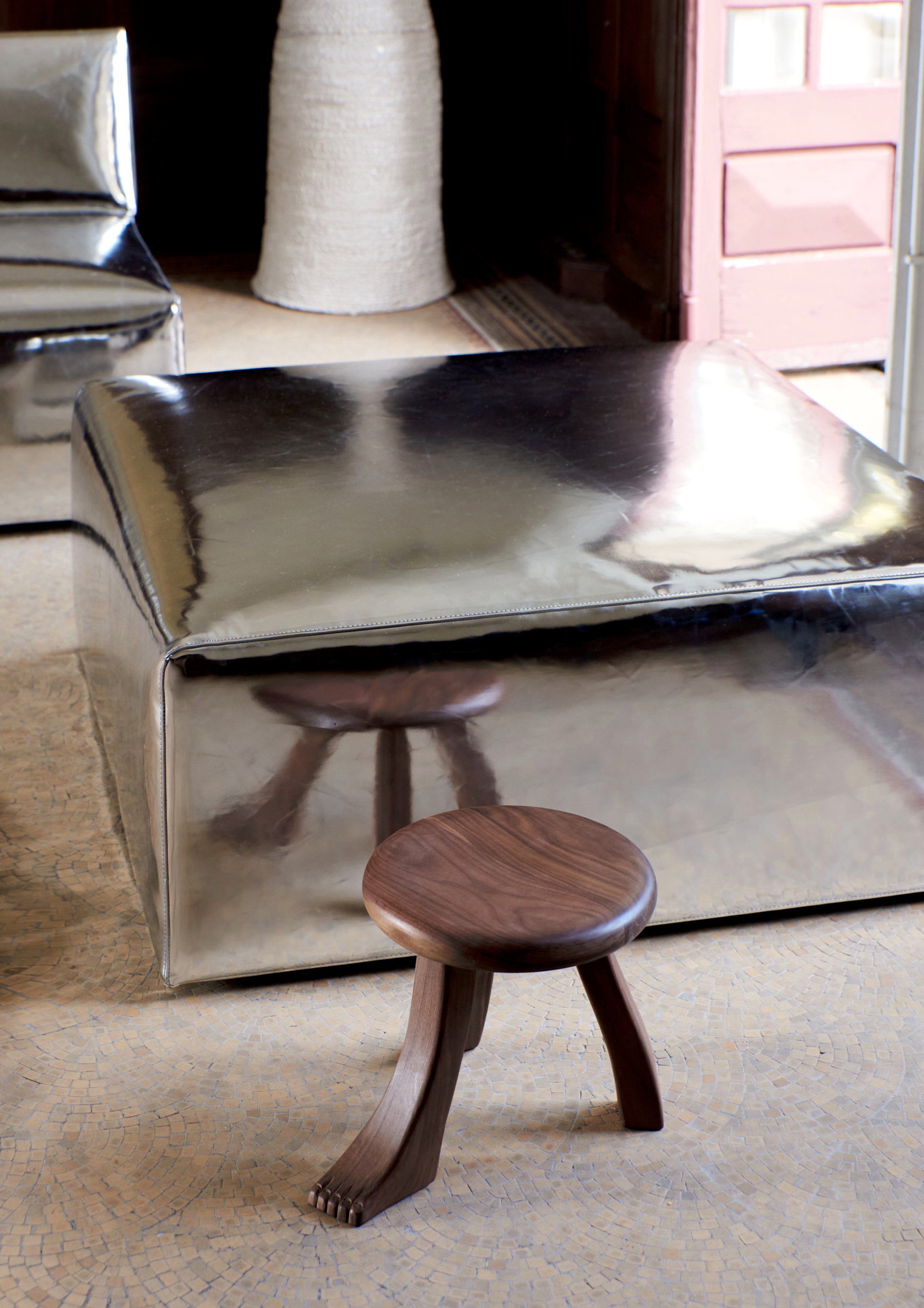Foot Stool in Oak — top view of round oak seat with wooden legs