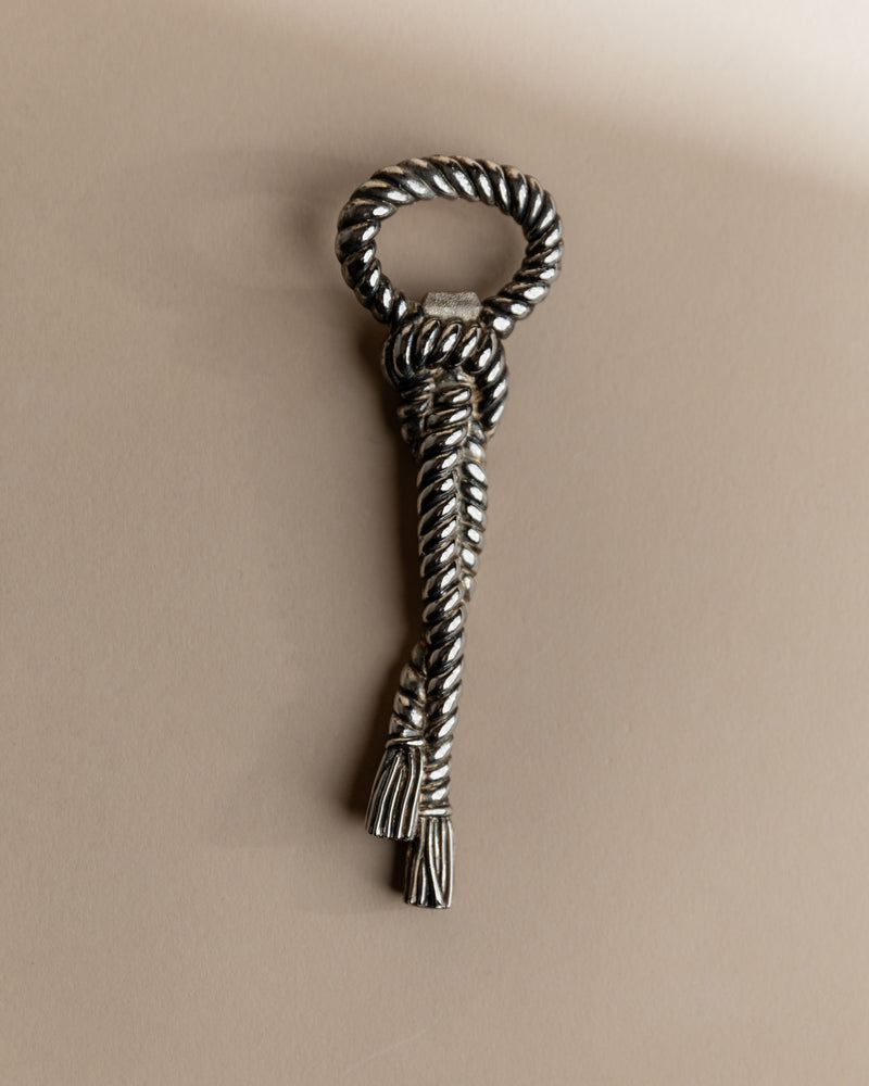 1940s silver-plated rope twist bottle opener with decorative handle