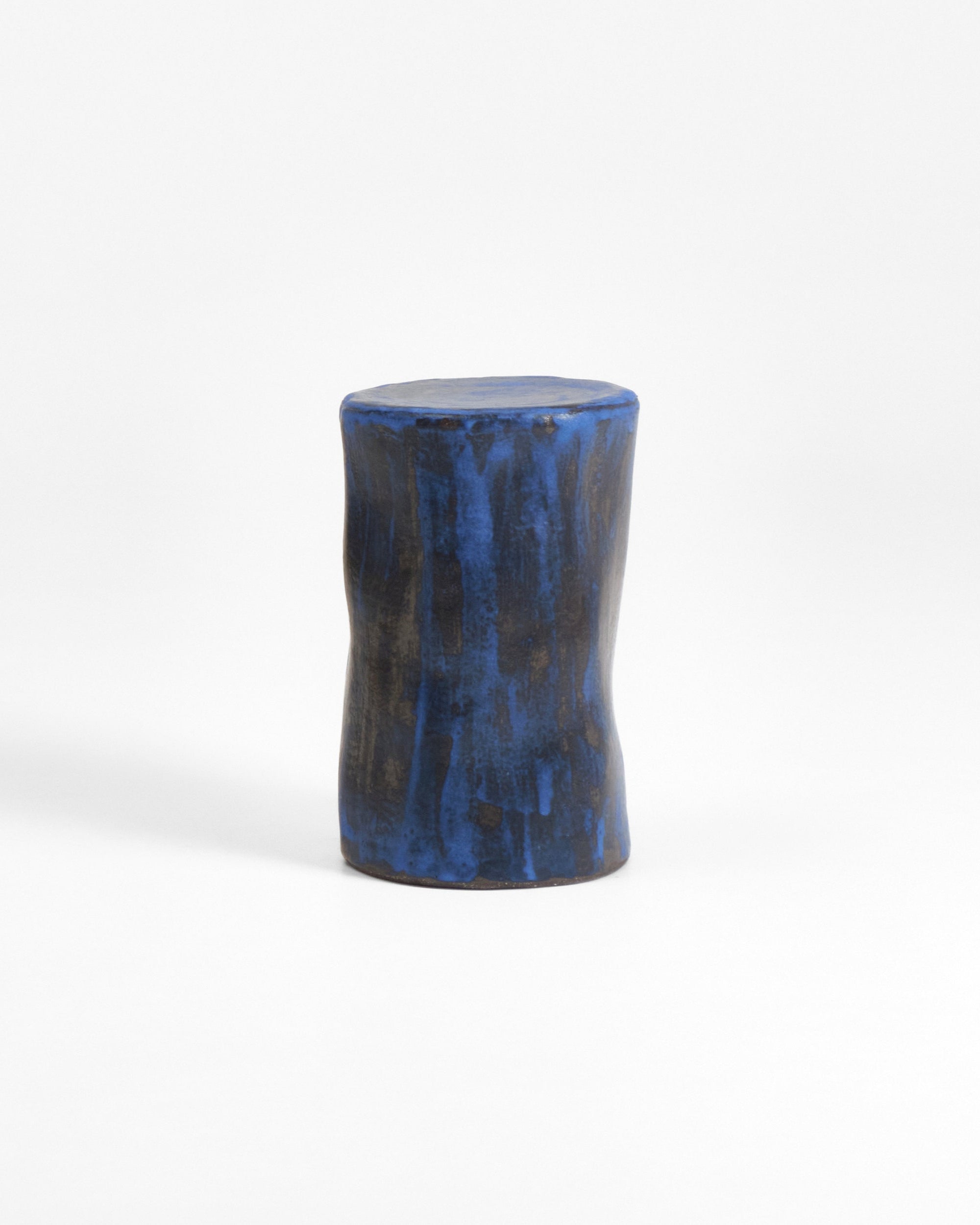Small Ceramic Side Table — close-up of textured blue surface
