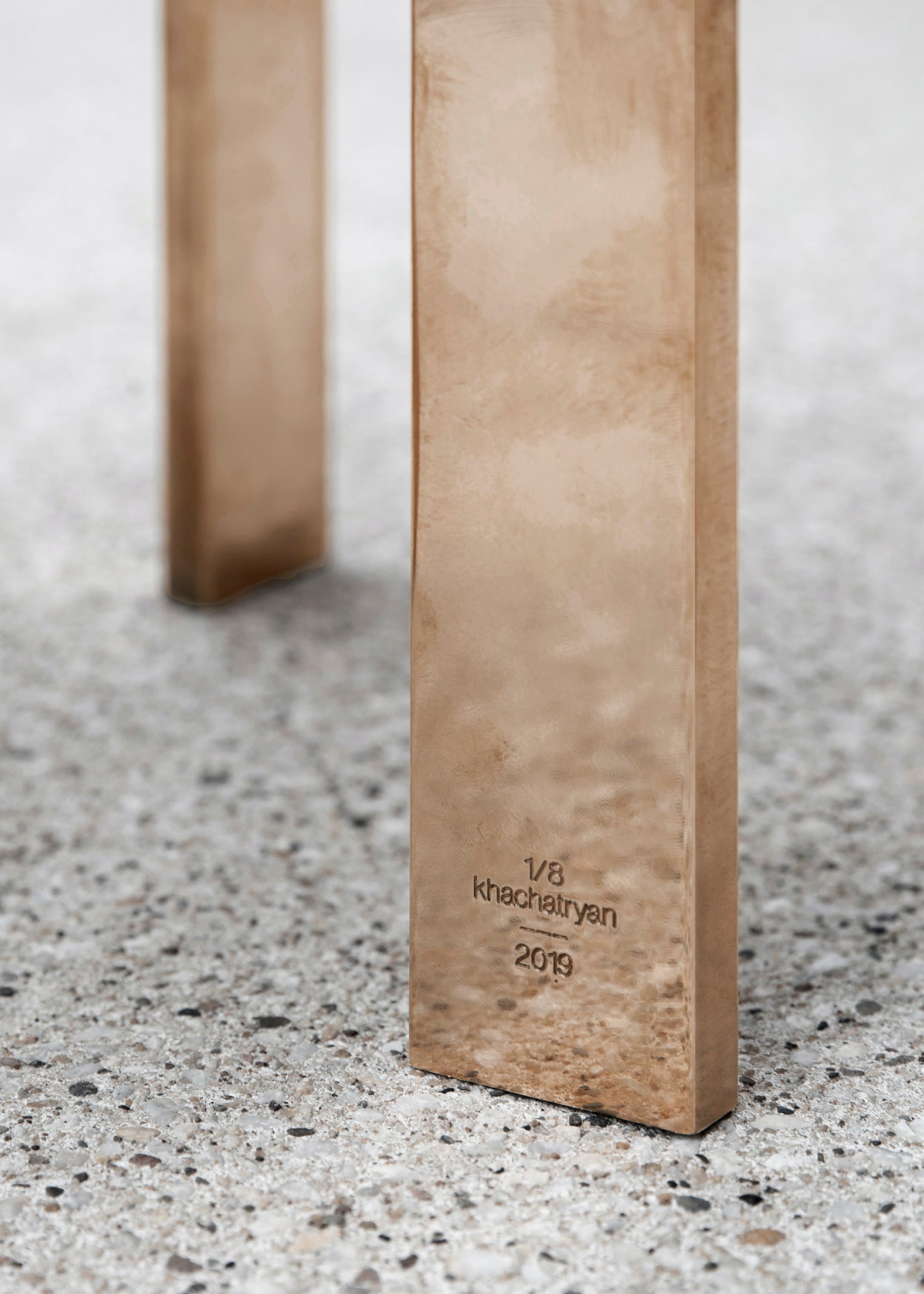 Ch 19.1 [b] - Low Chair — close-up of polished brass leg detail