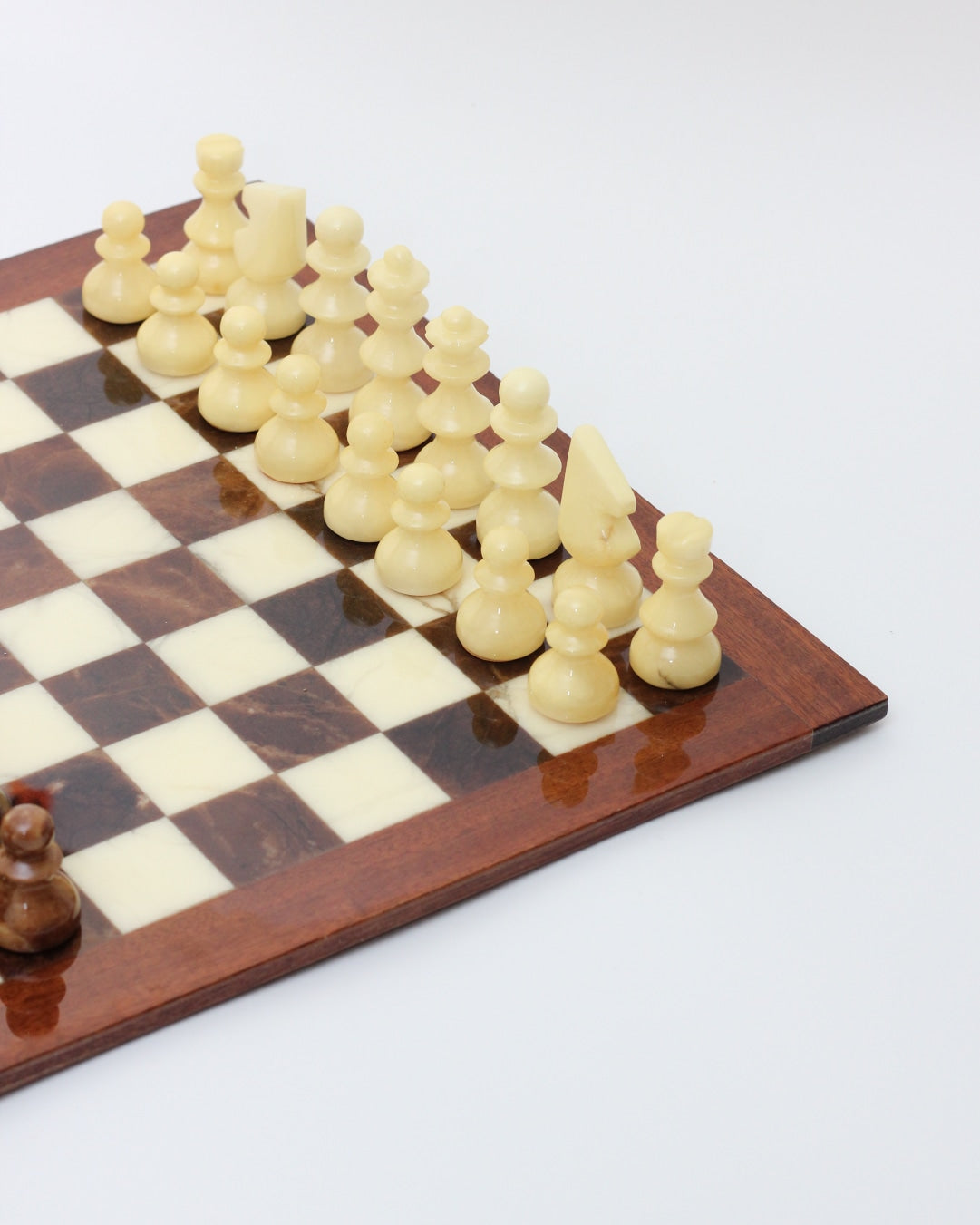 Marble Chess — angled view of cream and brown marble board