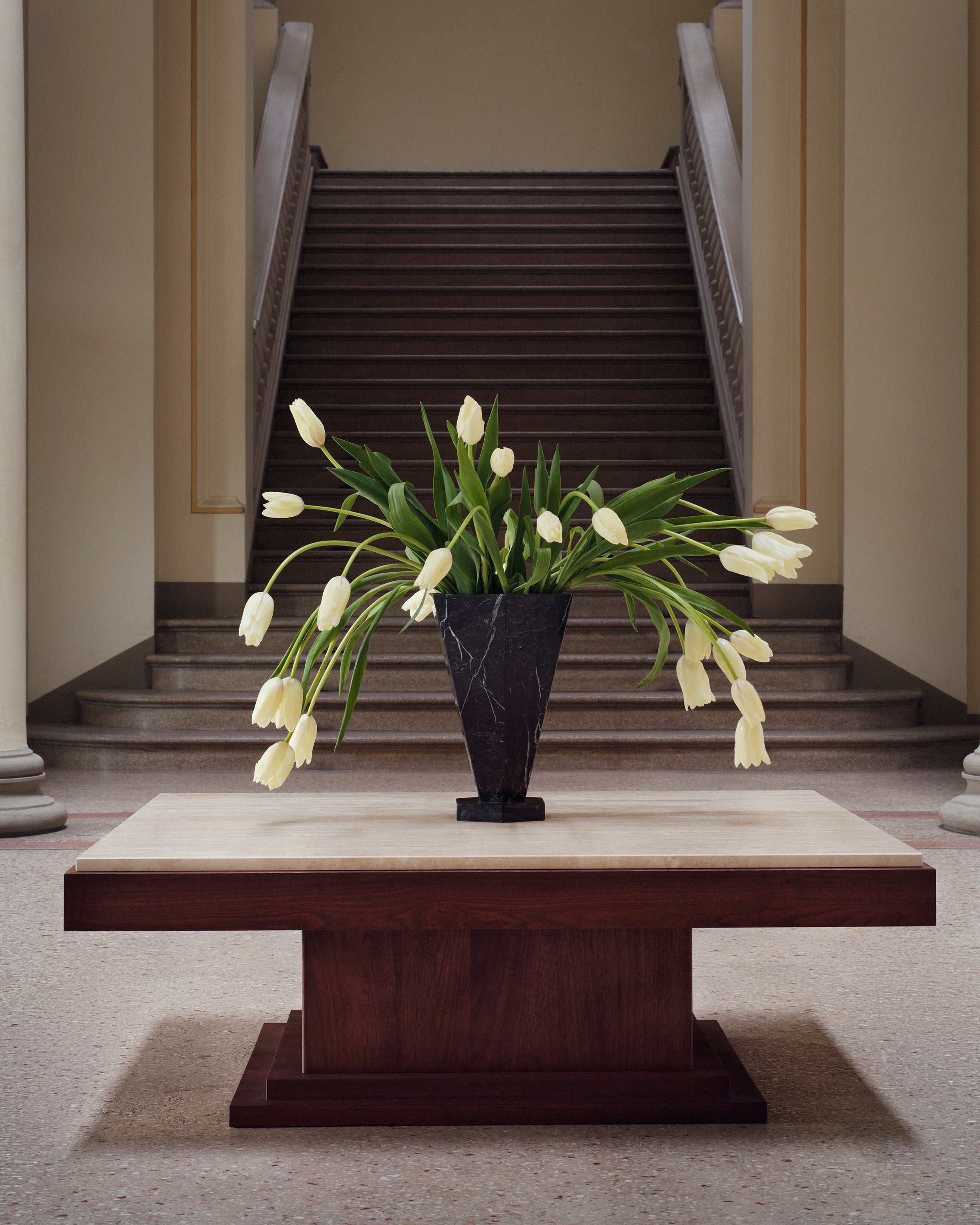 Sofa Table 01 Walnut Wood and Travertine — side angle with floral arrangement